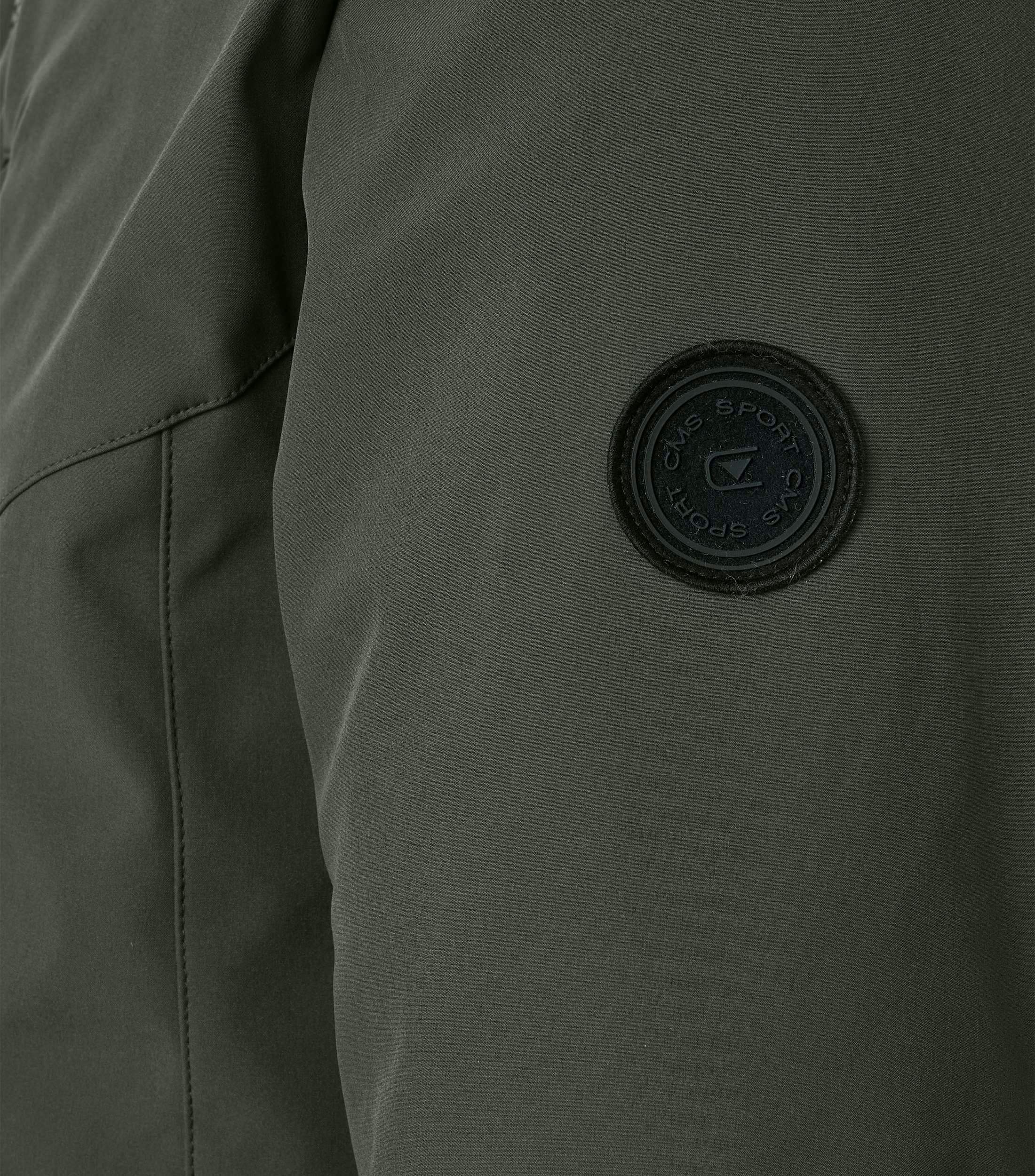 Eine Jacke im uni Muster in der Farbe Dunkelgrün