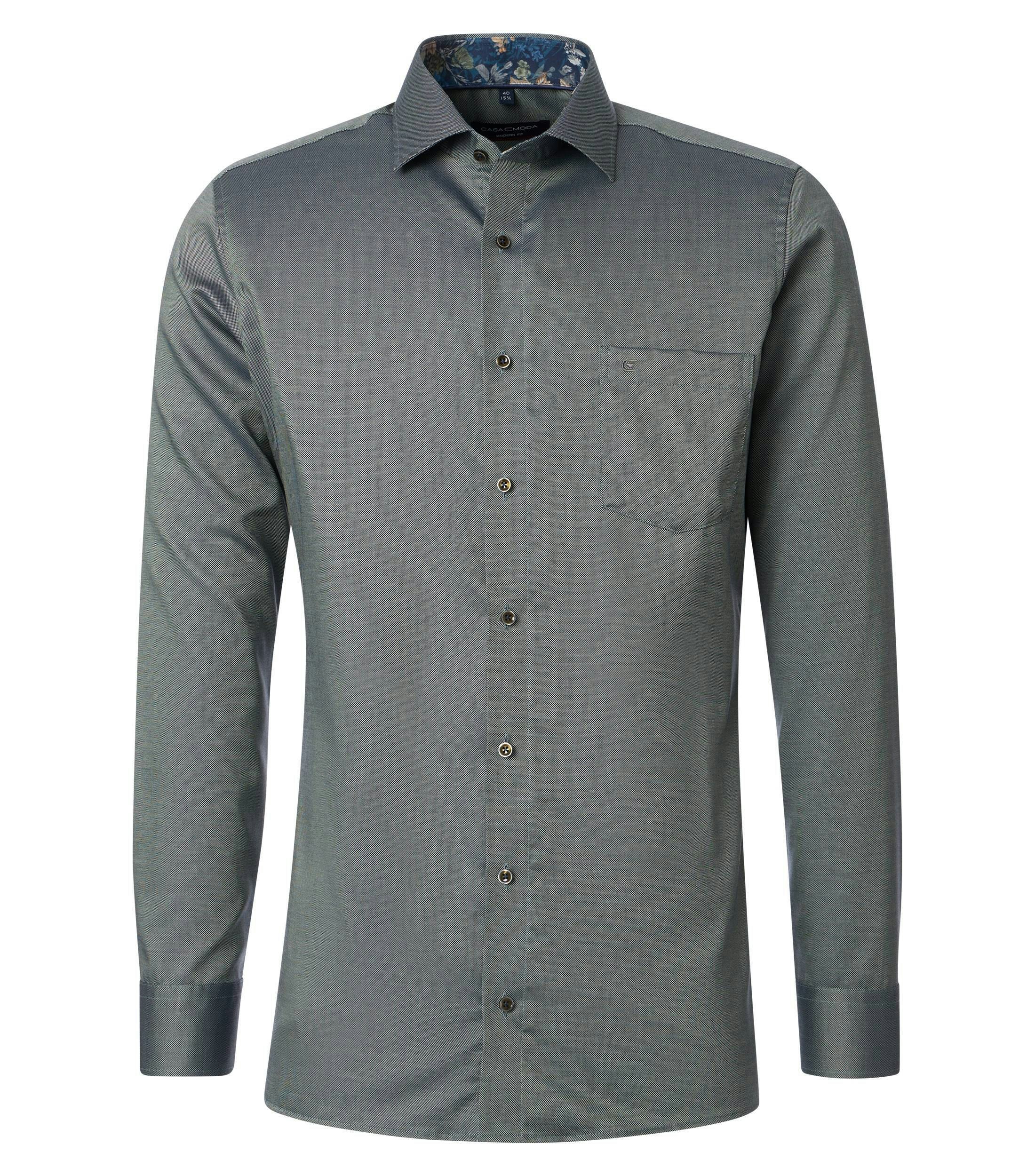 Ein Businesshemd im uni Muster in der Farbe Dunkelgrün