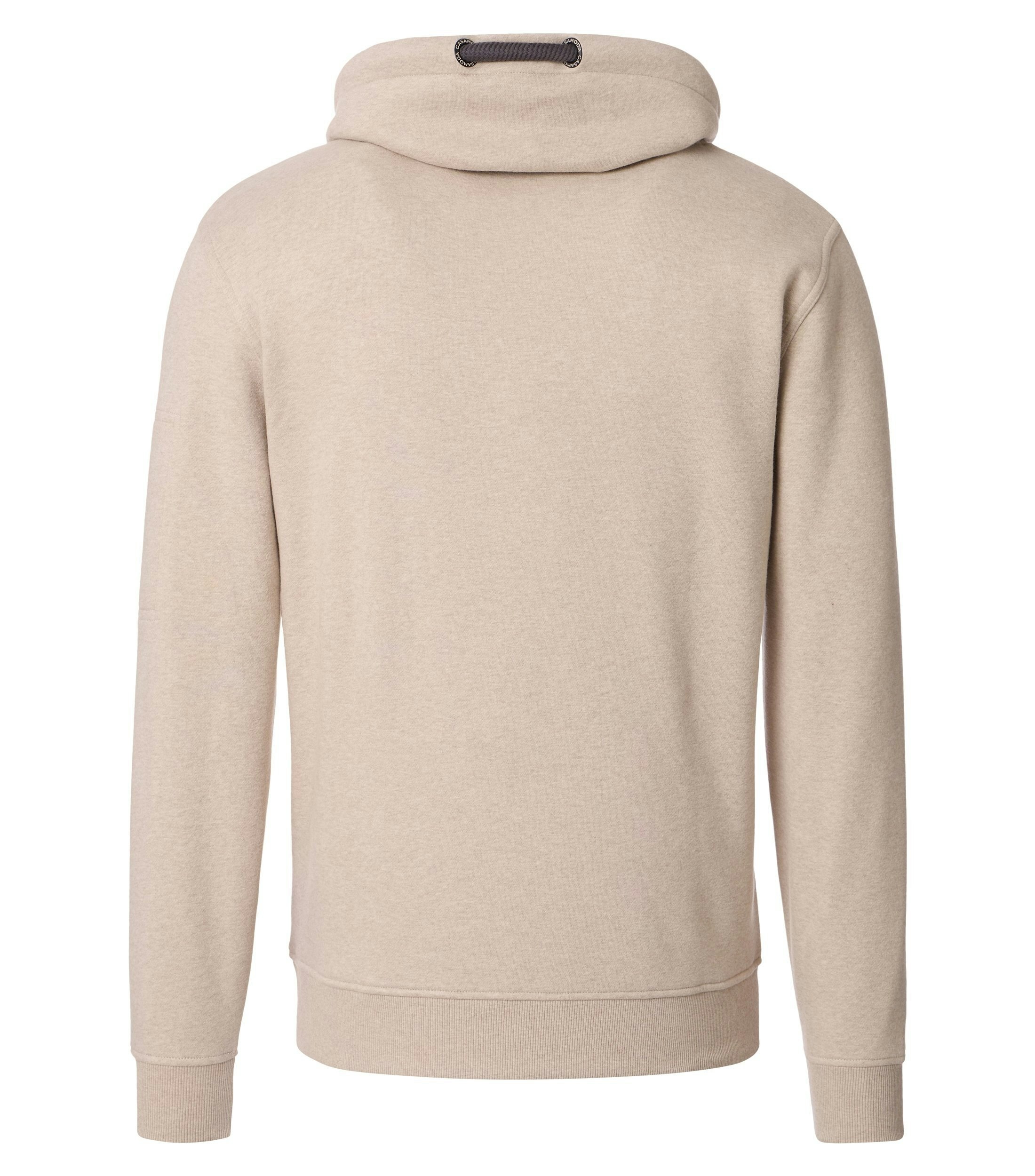 Das Model trägt ein Pullover im uni Muster in der Farbe Champagner Beige