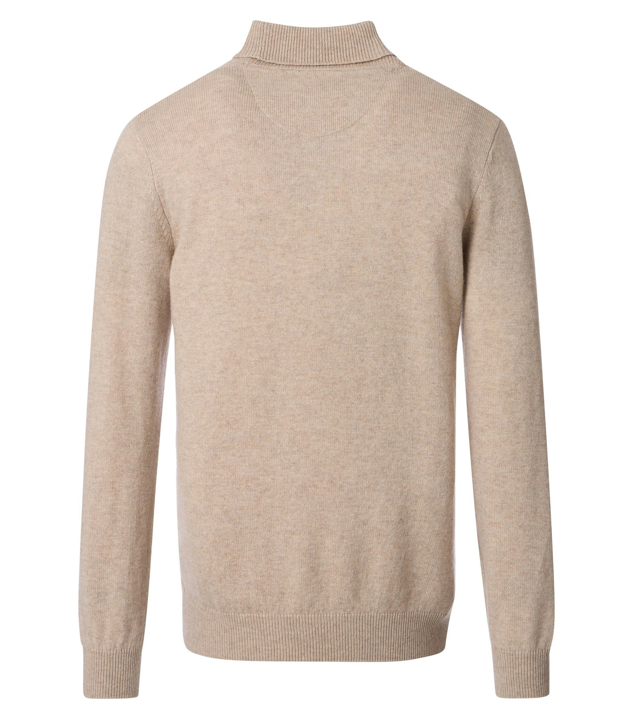 Das Model trägt ein Pullover im uni Muster in der Farbe Beige