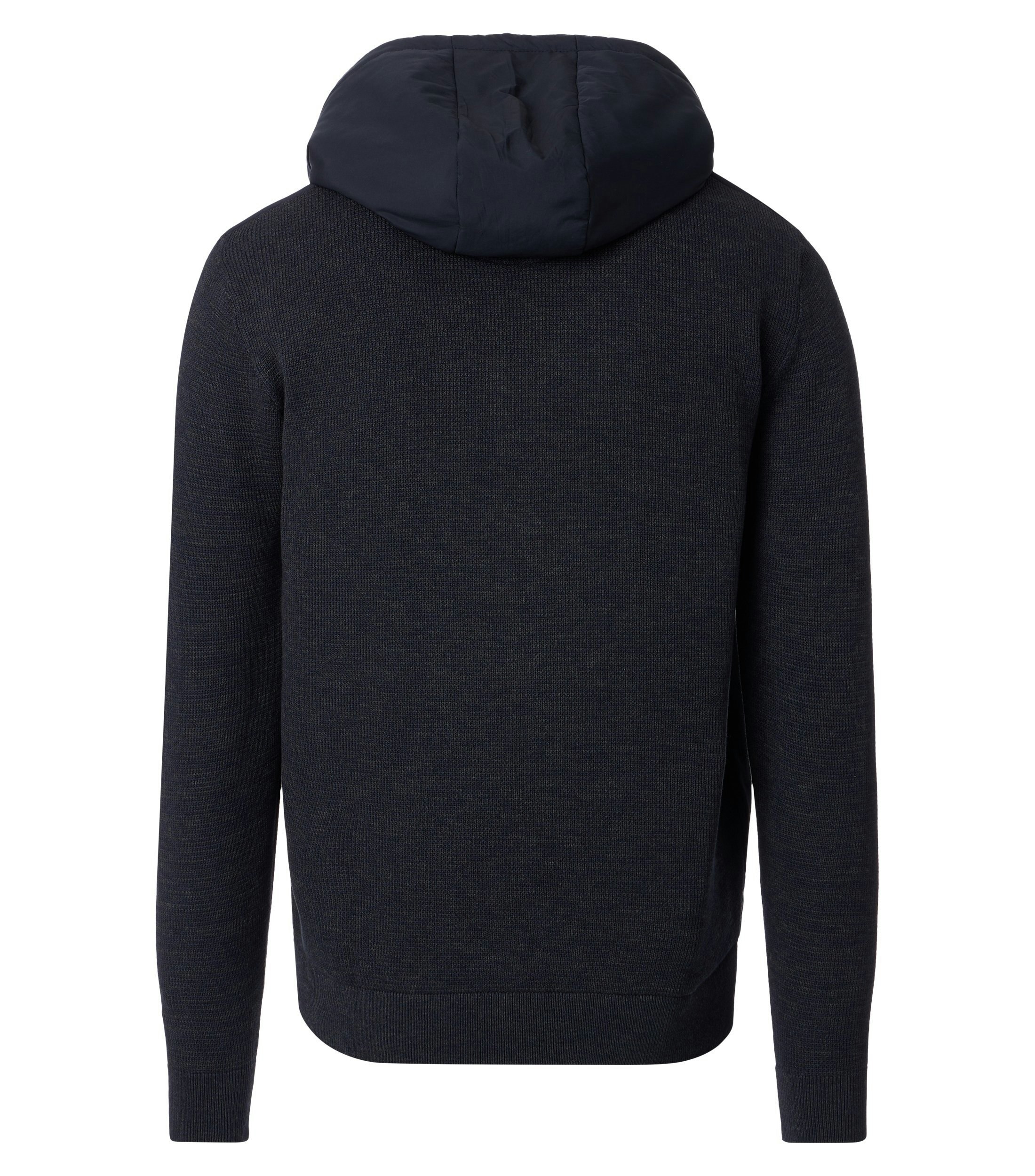 Das Model trägt eine Strickjacken im uni Muster in der Farbe Dunkelblau