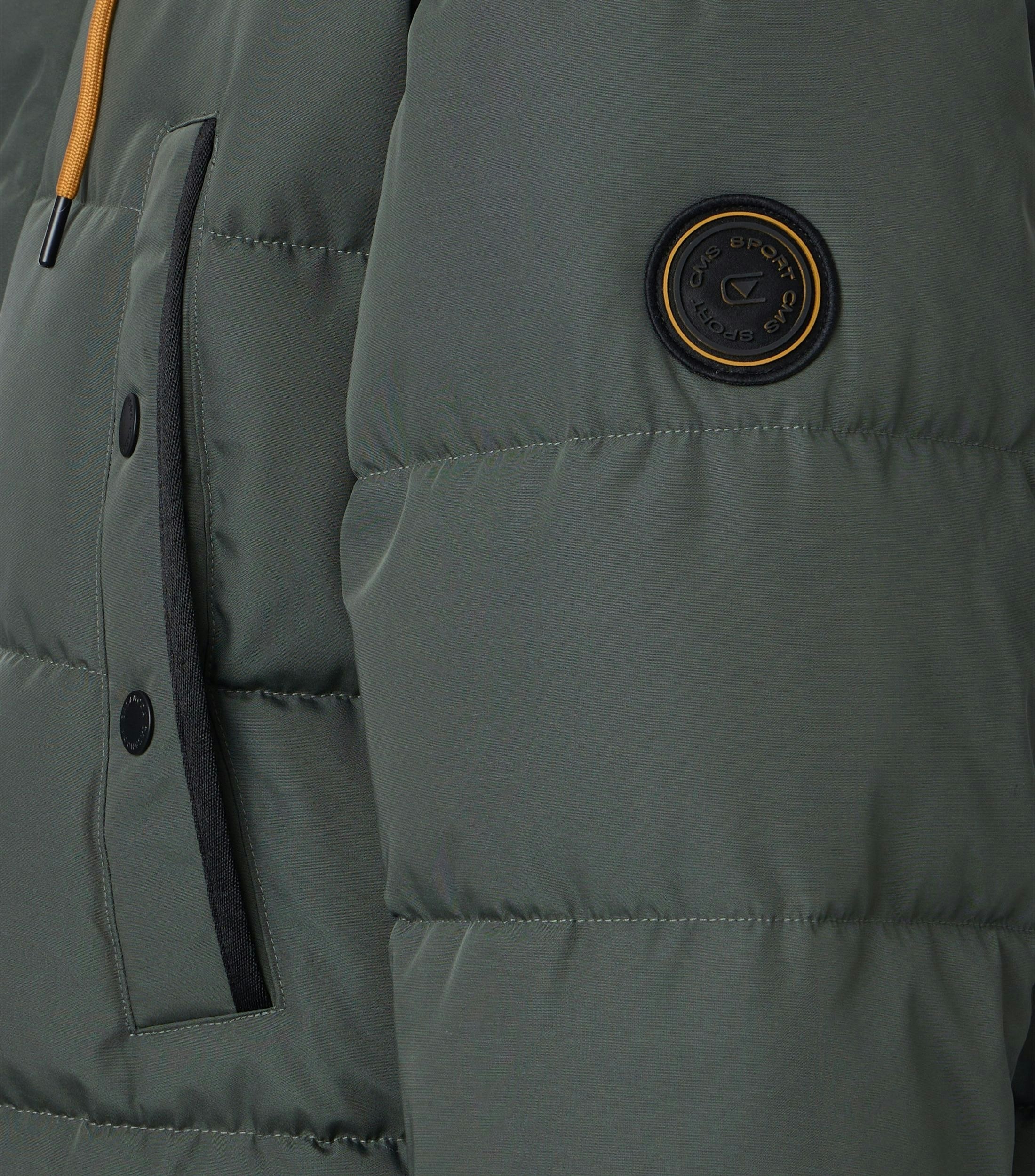 Eine Jacke im uni Muster in der Farbe TÃ¼rkisgrÃ¼n