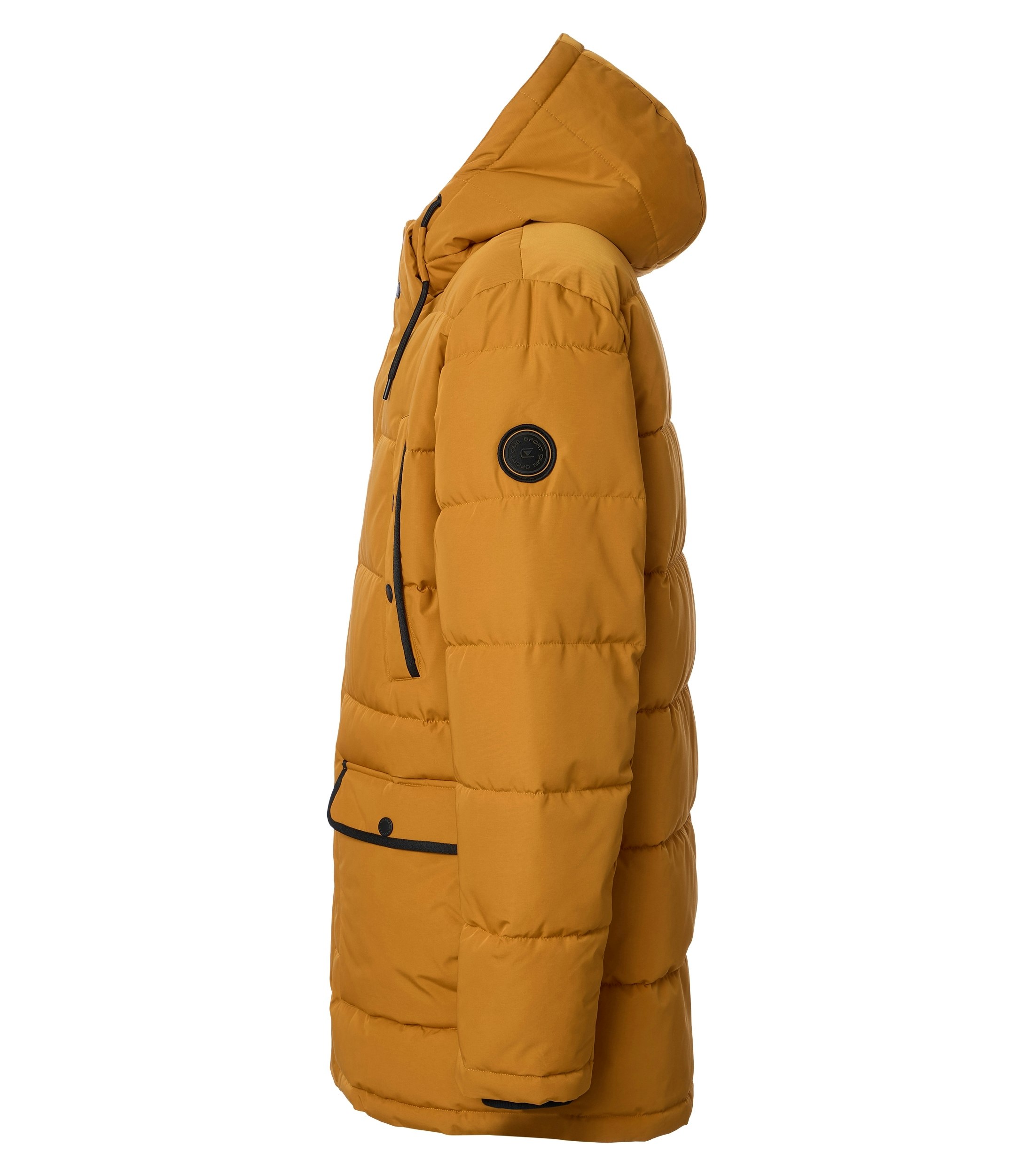 Das Model trägt eine Jacke im uni Muster in der Farbe Gelb