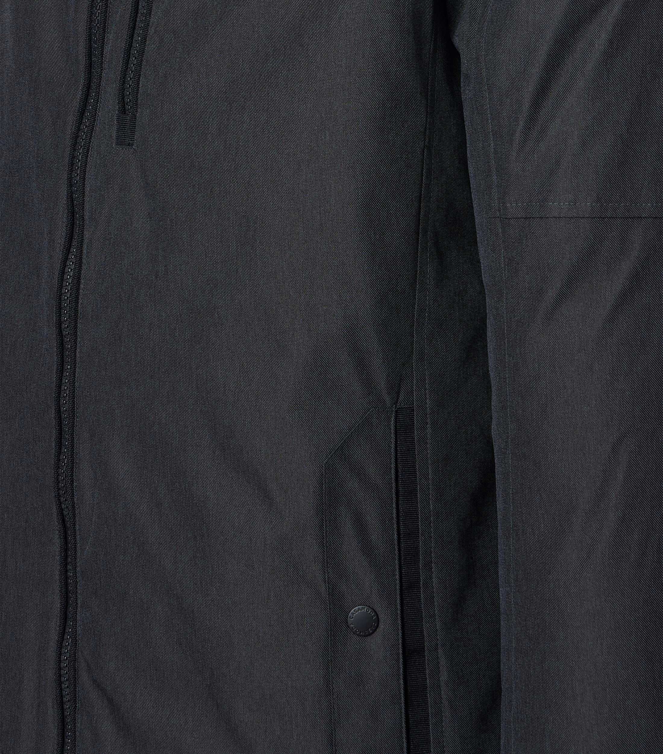 Eine Jacke im uni Muster in der Farbe Grauschwarz