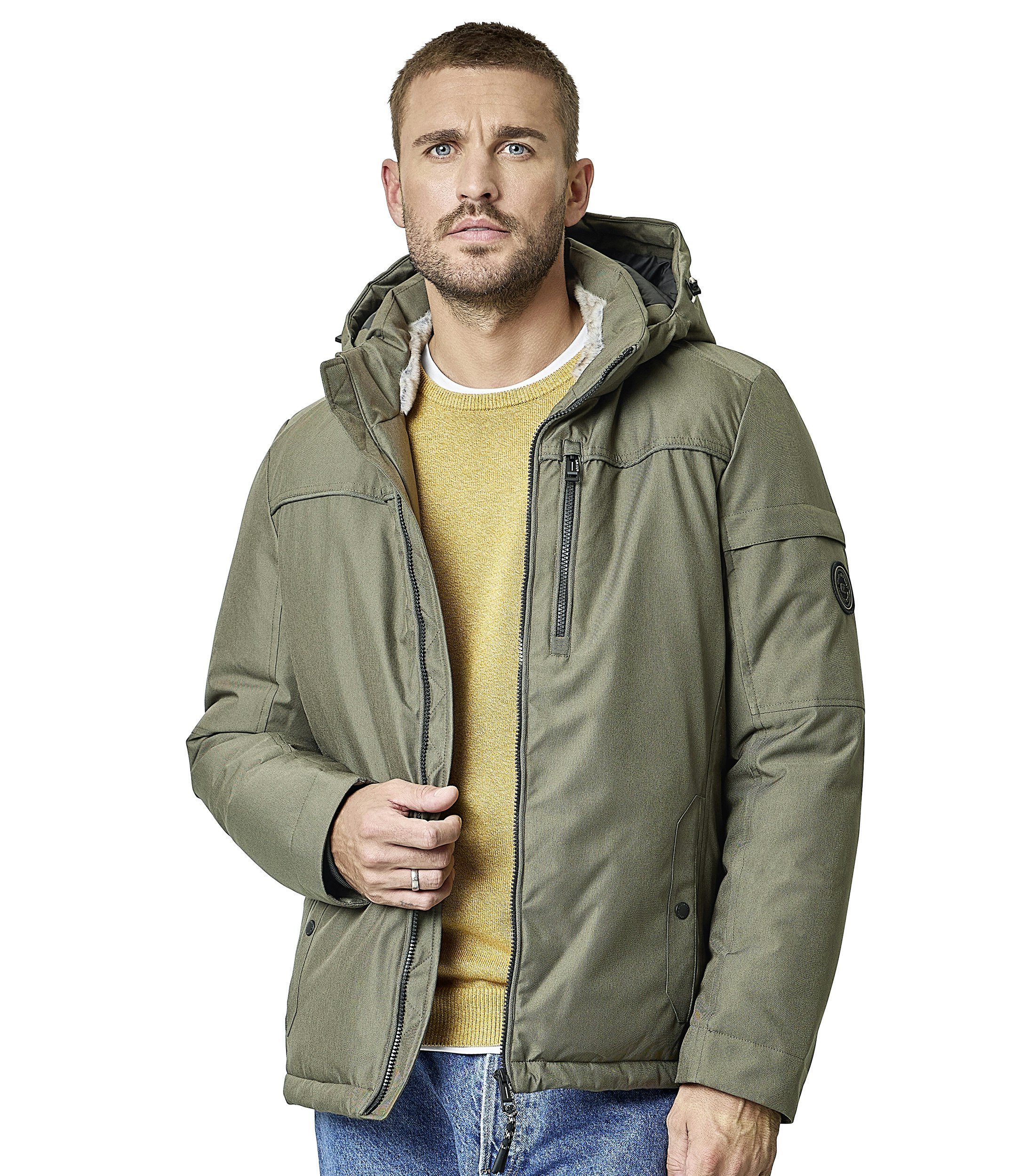 Das Model trägt eine Jacke im uni Muster in der Farbe DunkelgrÃ¼n