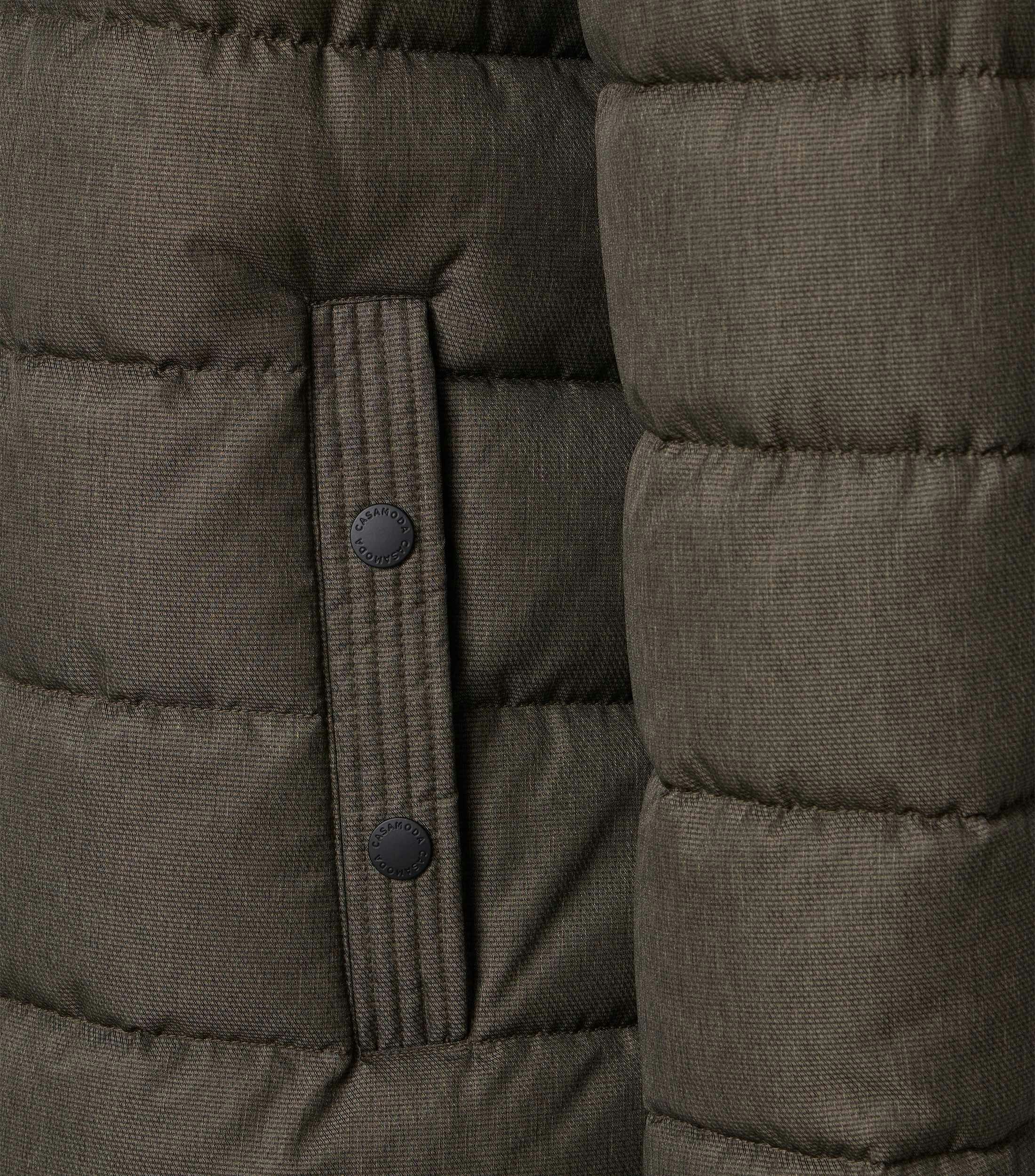 Eine Jacke im uni Muster in der Farbe Dunkelgrün