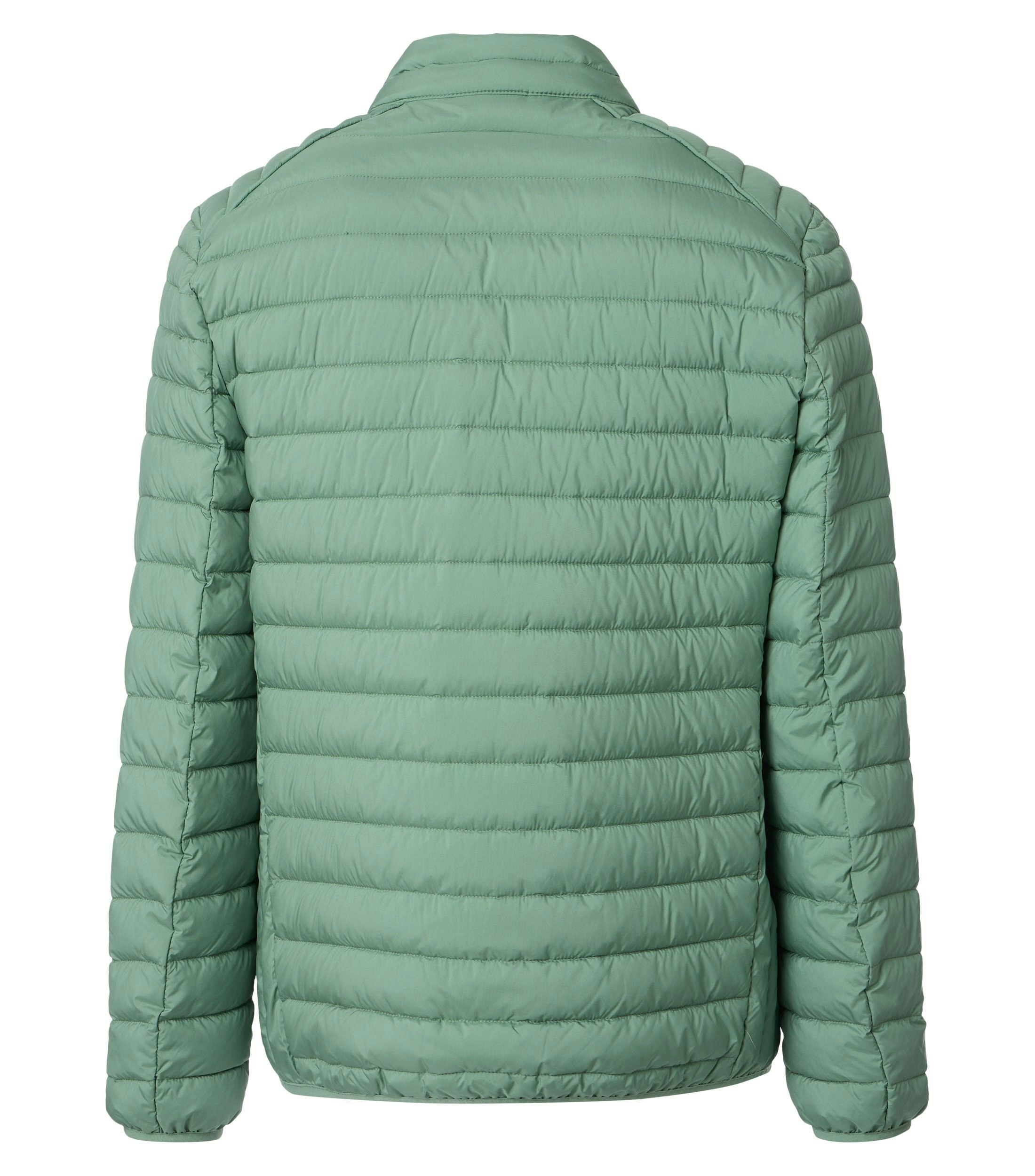 Eine Jacke im uni Muster in der Farbe Hellgrün