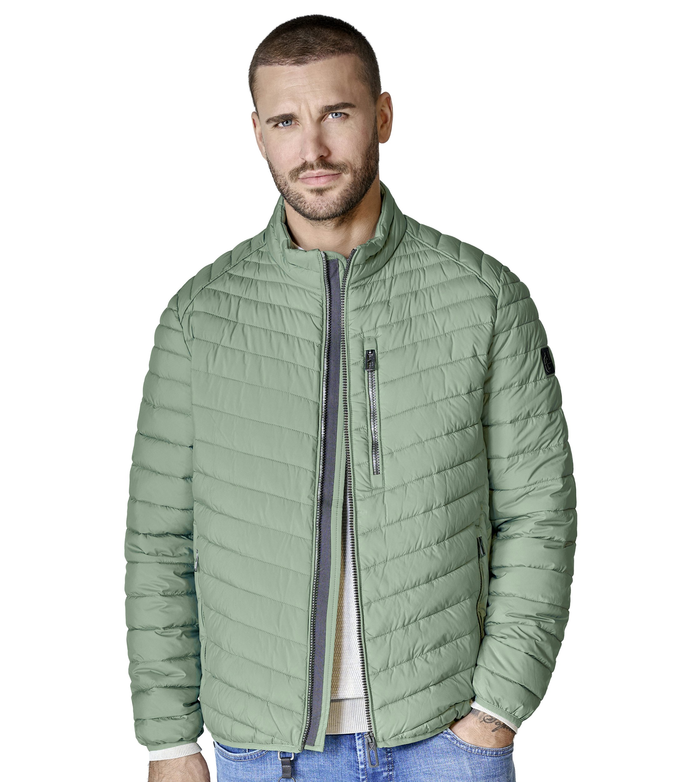 Eine Jacke im uni Muster in der Farbe Hellgrün