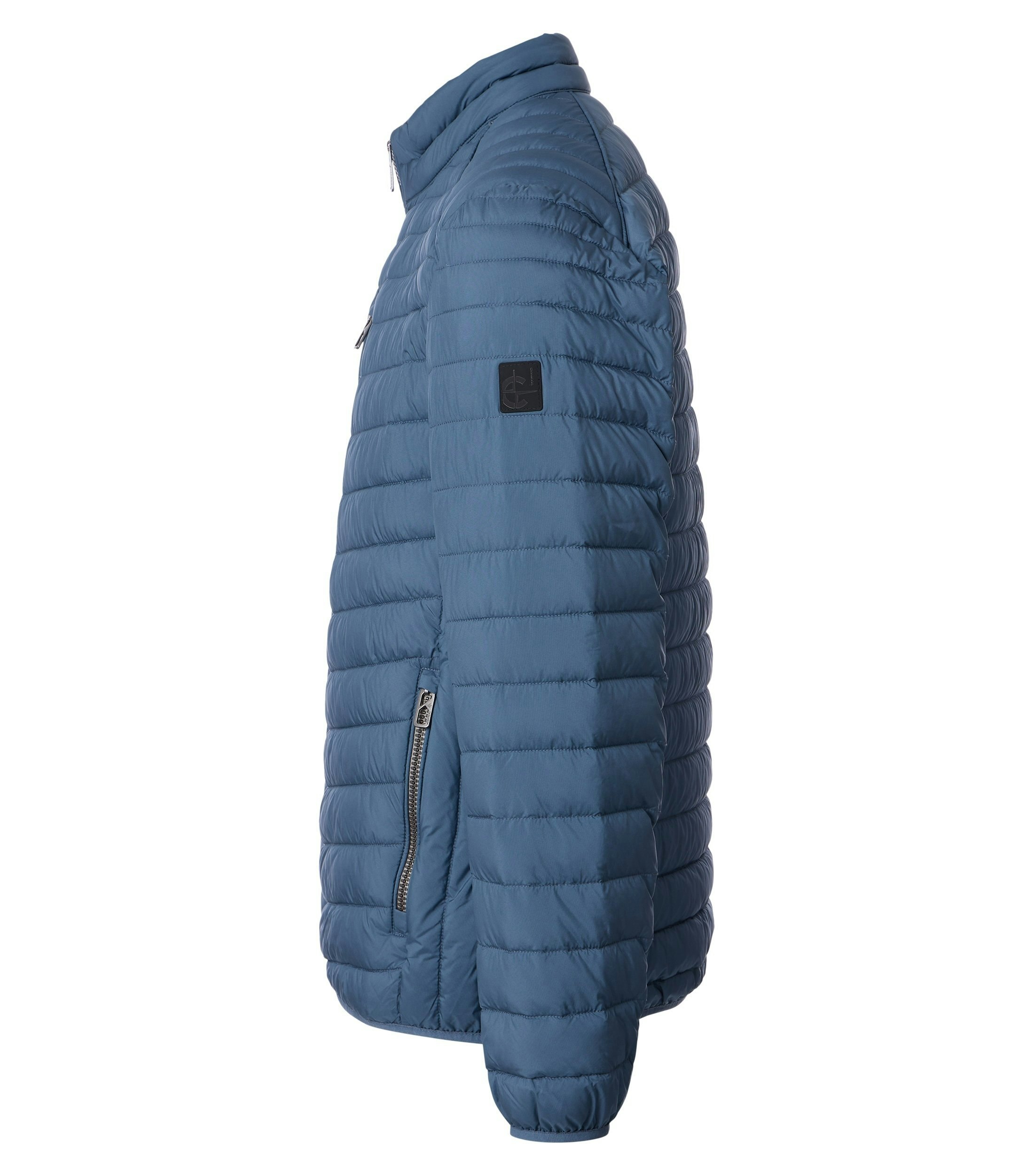 Eine Jacke im uni Muster in der Farbe Blau