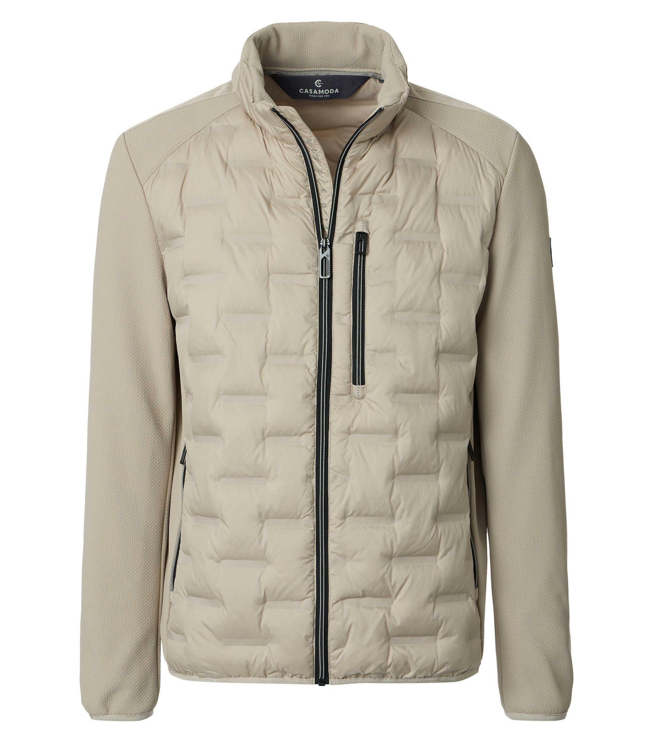 Eine Jacke im uni Muster in der Farbe Beige