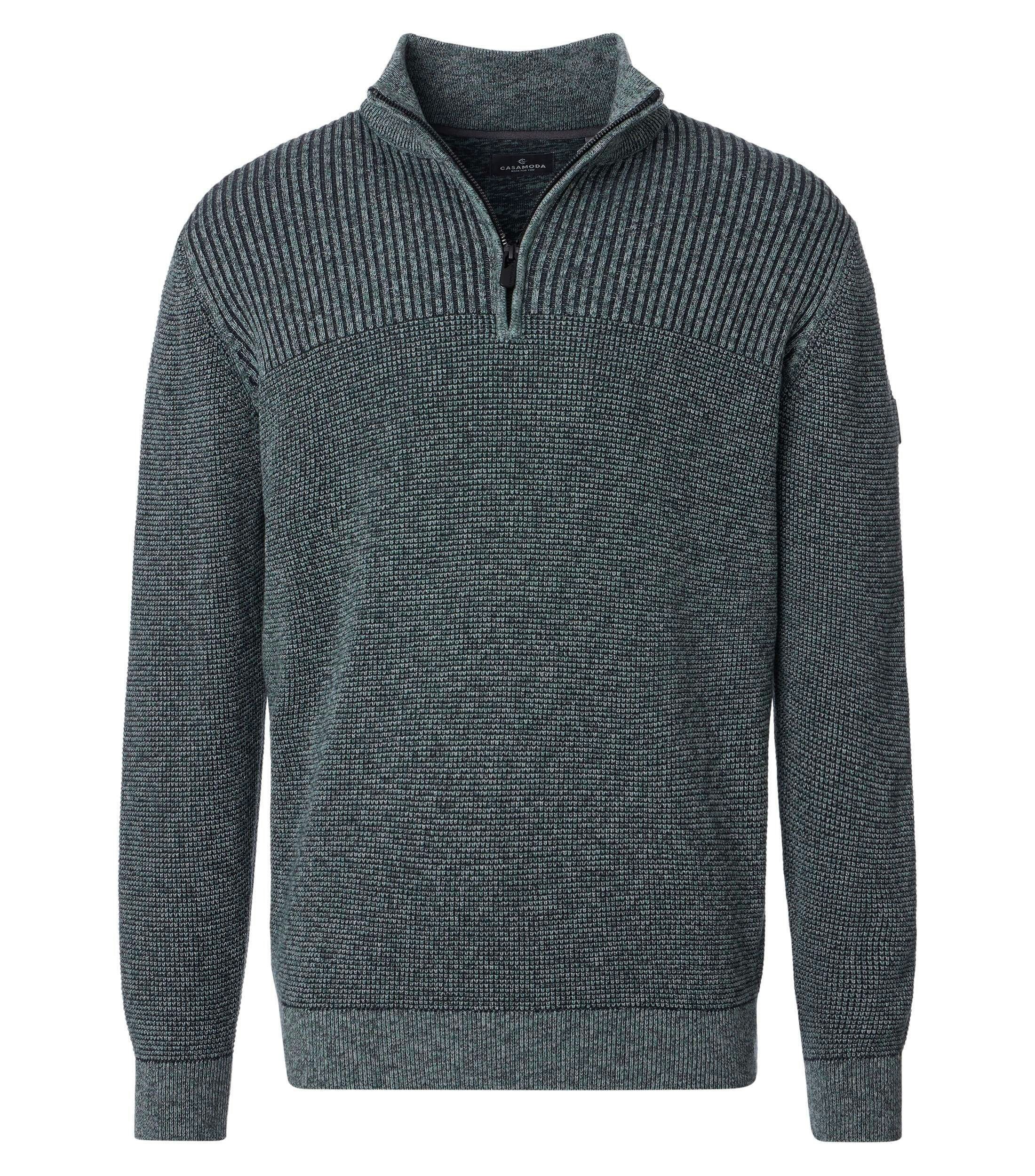 Ein Pullover im uni Muster in der Farbe Dunkelgrün