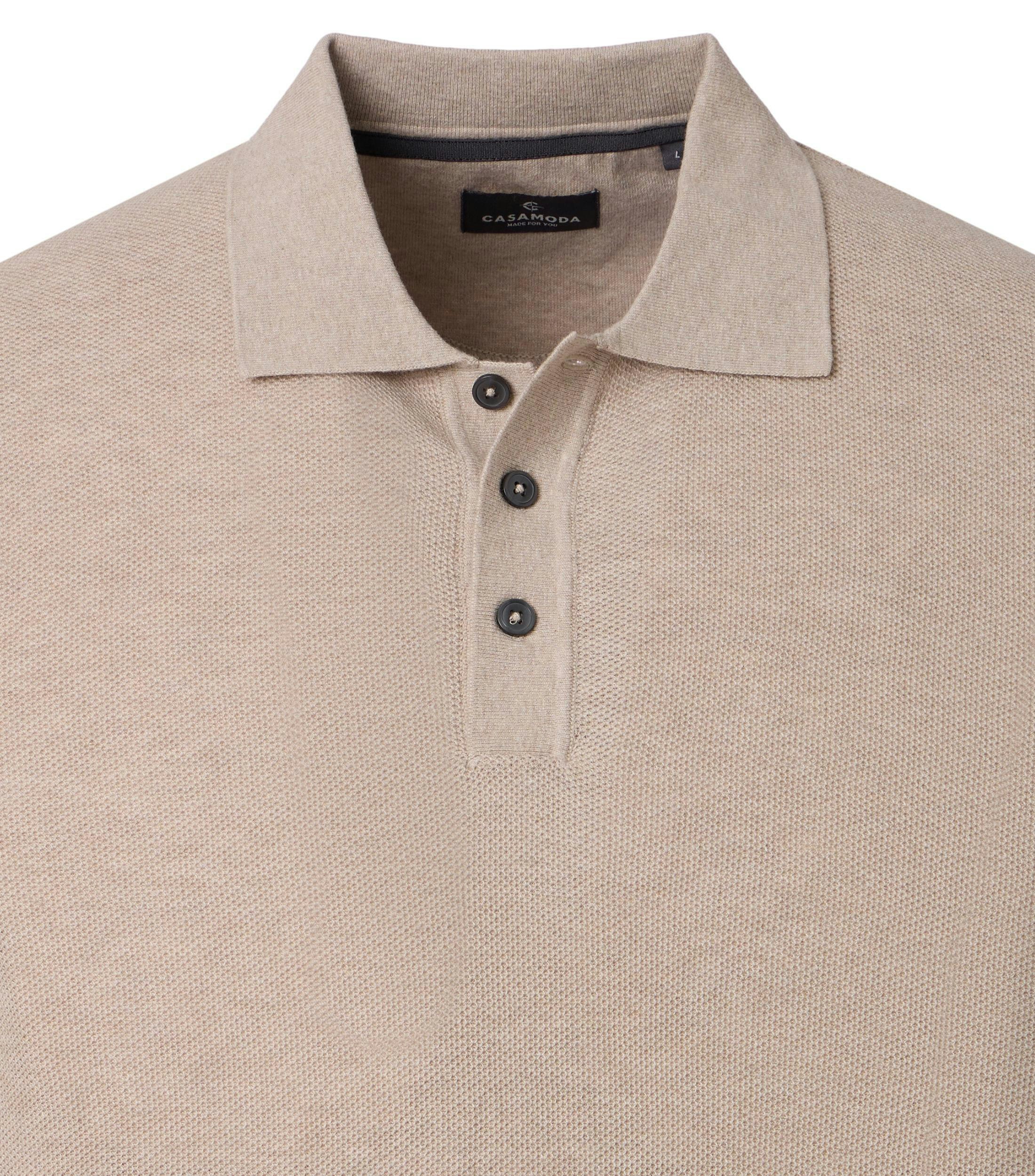 Ein Polo-Shirt im uni Muster in der Farbe Beige