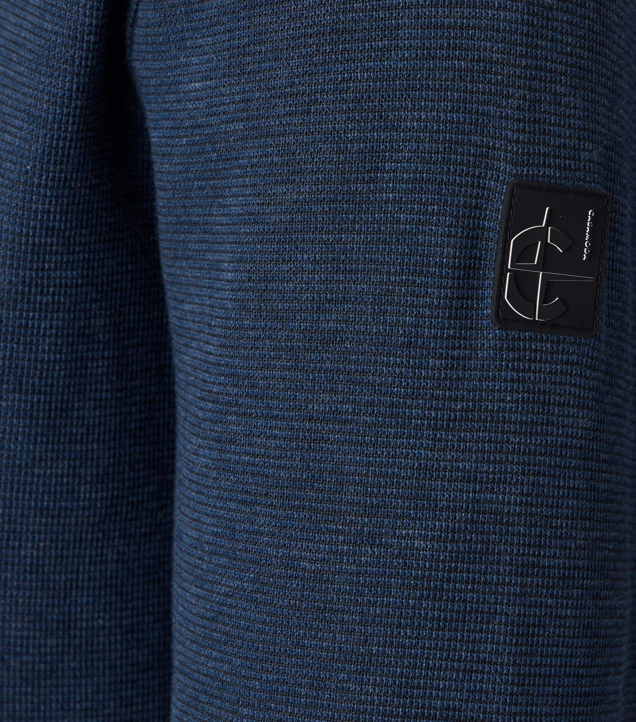 Ein Troyer im uni Muster in der Farbe Blau