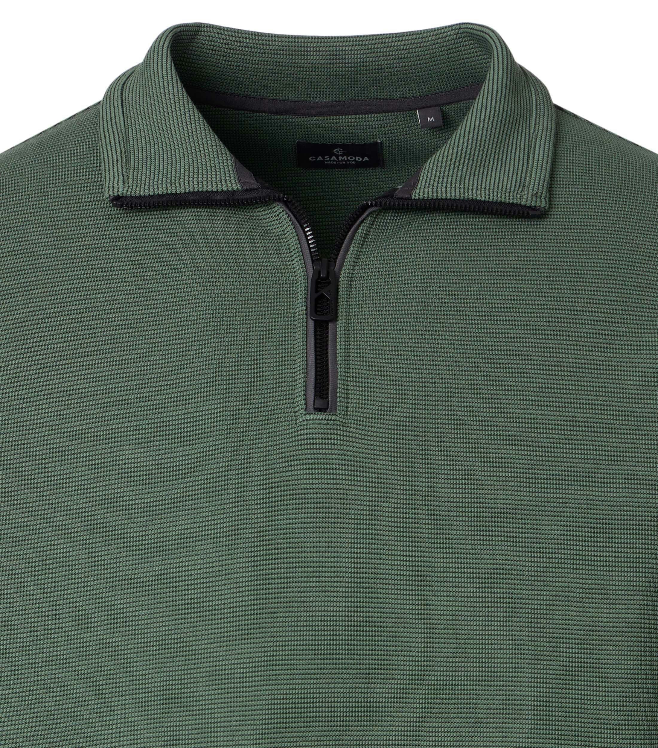 Ein Troyer im uni Muster in der Farbe Grün