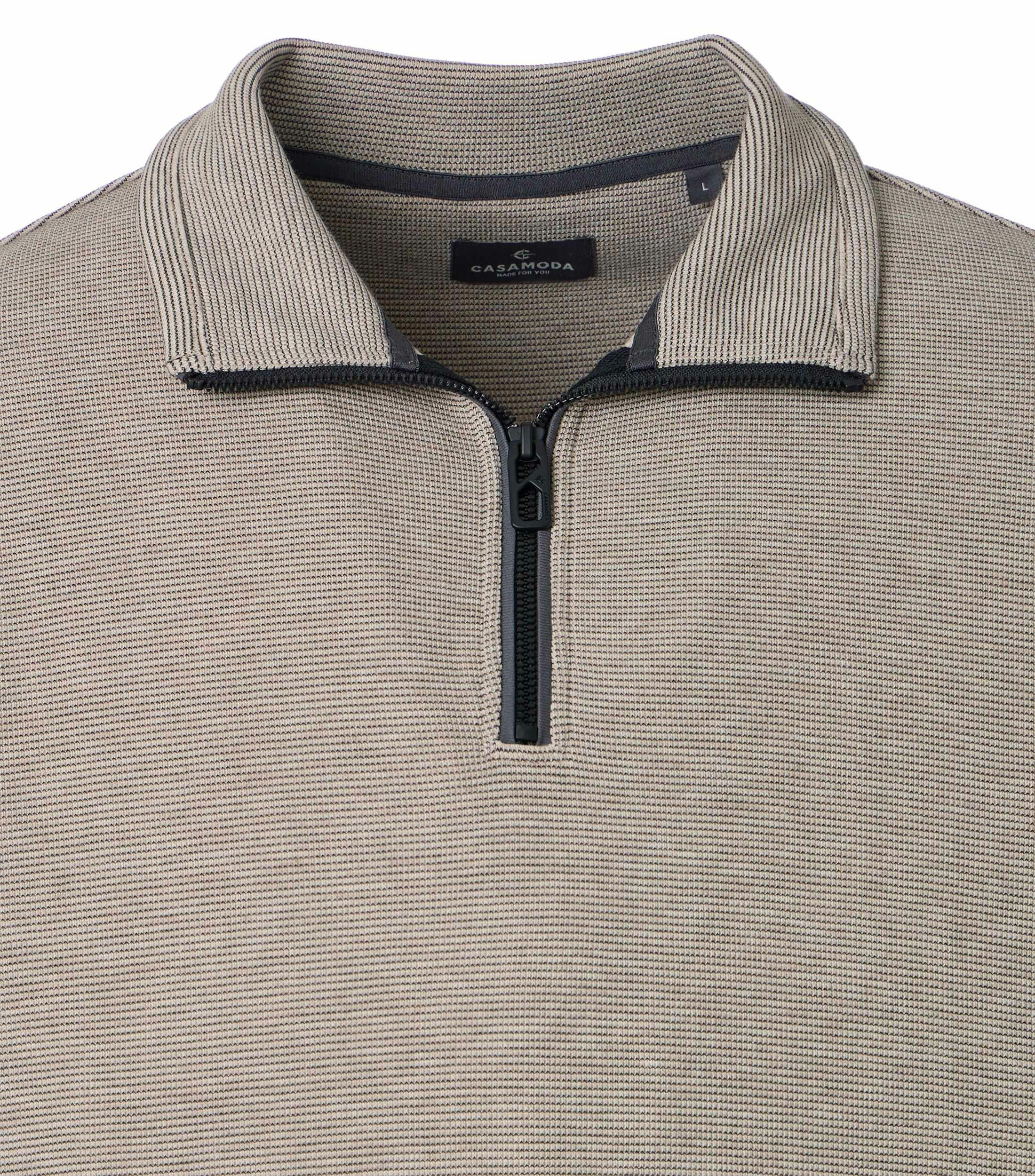 Ein Troyer im uni Muster in der Farbe Beige