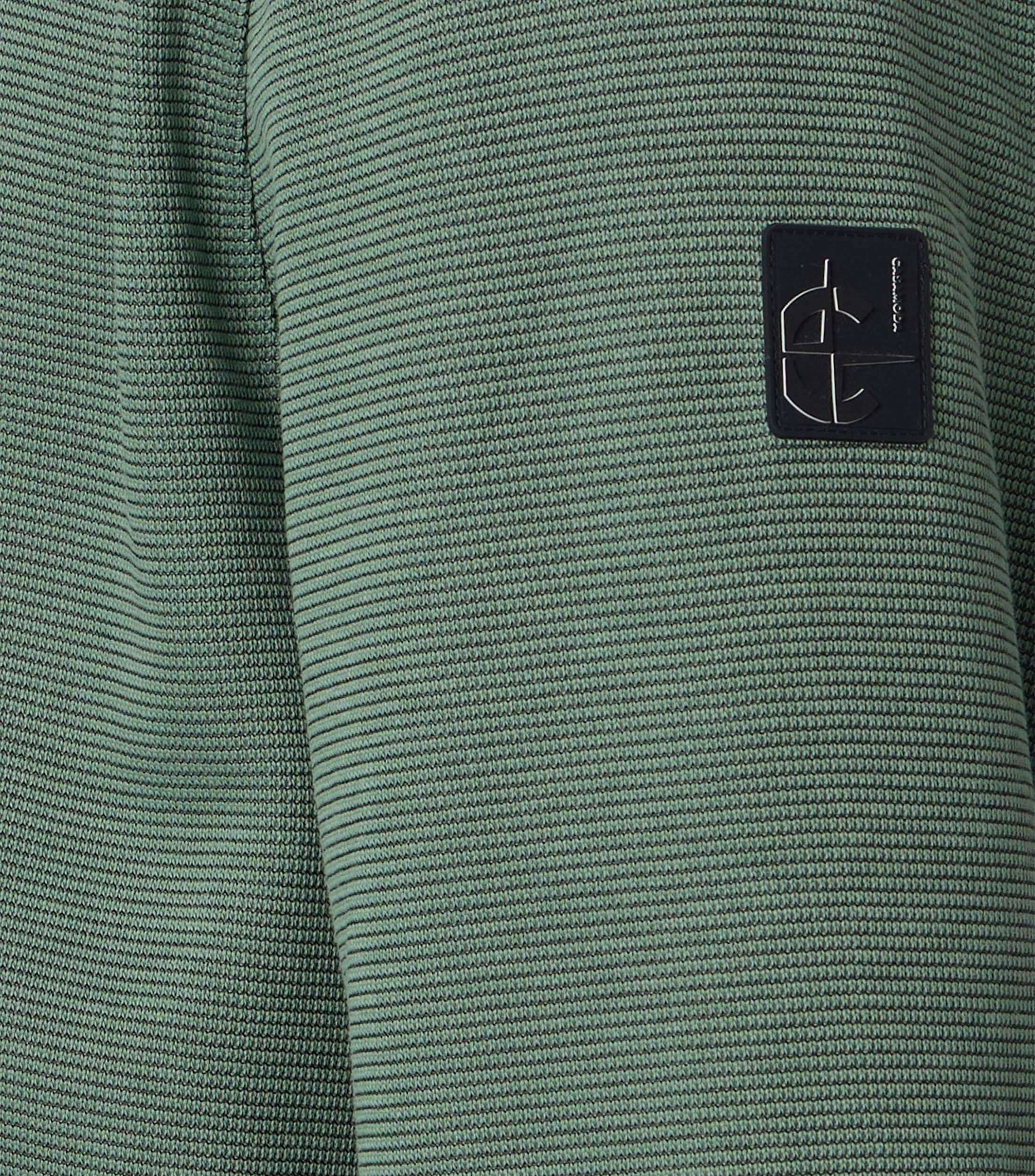 Eine Sweatweste im uni Muster in der Farbe Grün