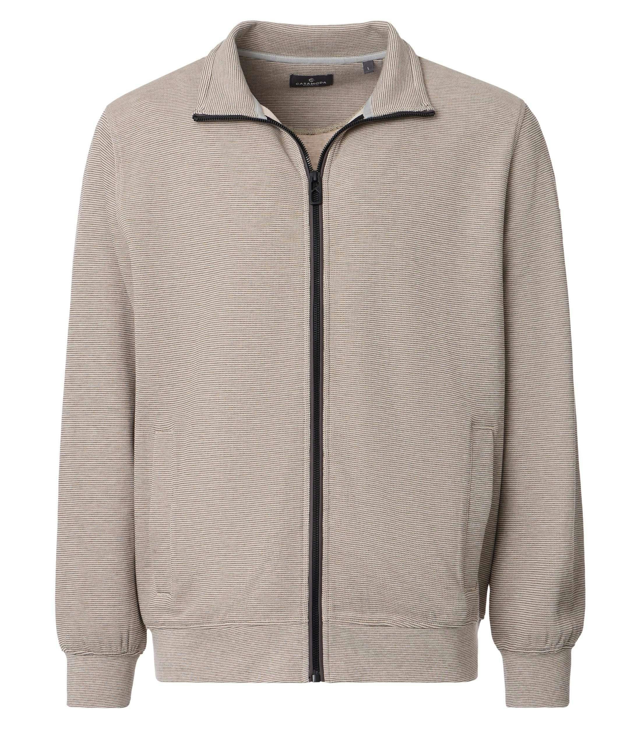 Eine Sweatweste im uni Muster in der Farbe Beige