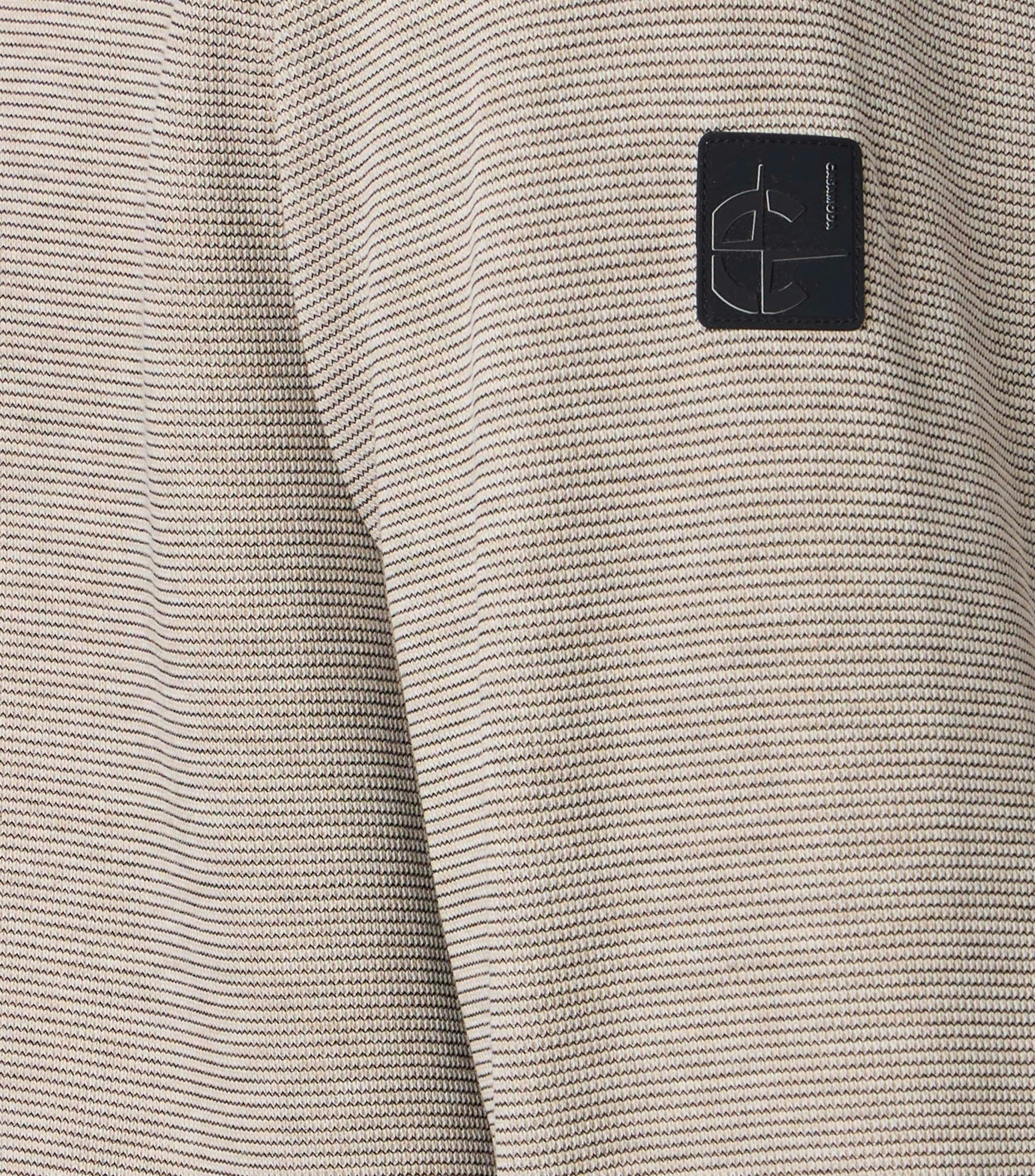 Eine Sweatweste im uni Muster in der Farbe Beige