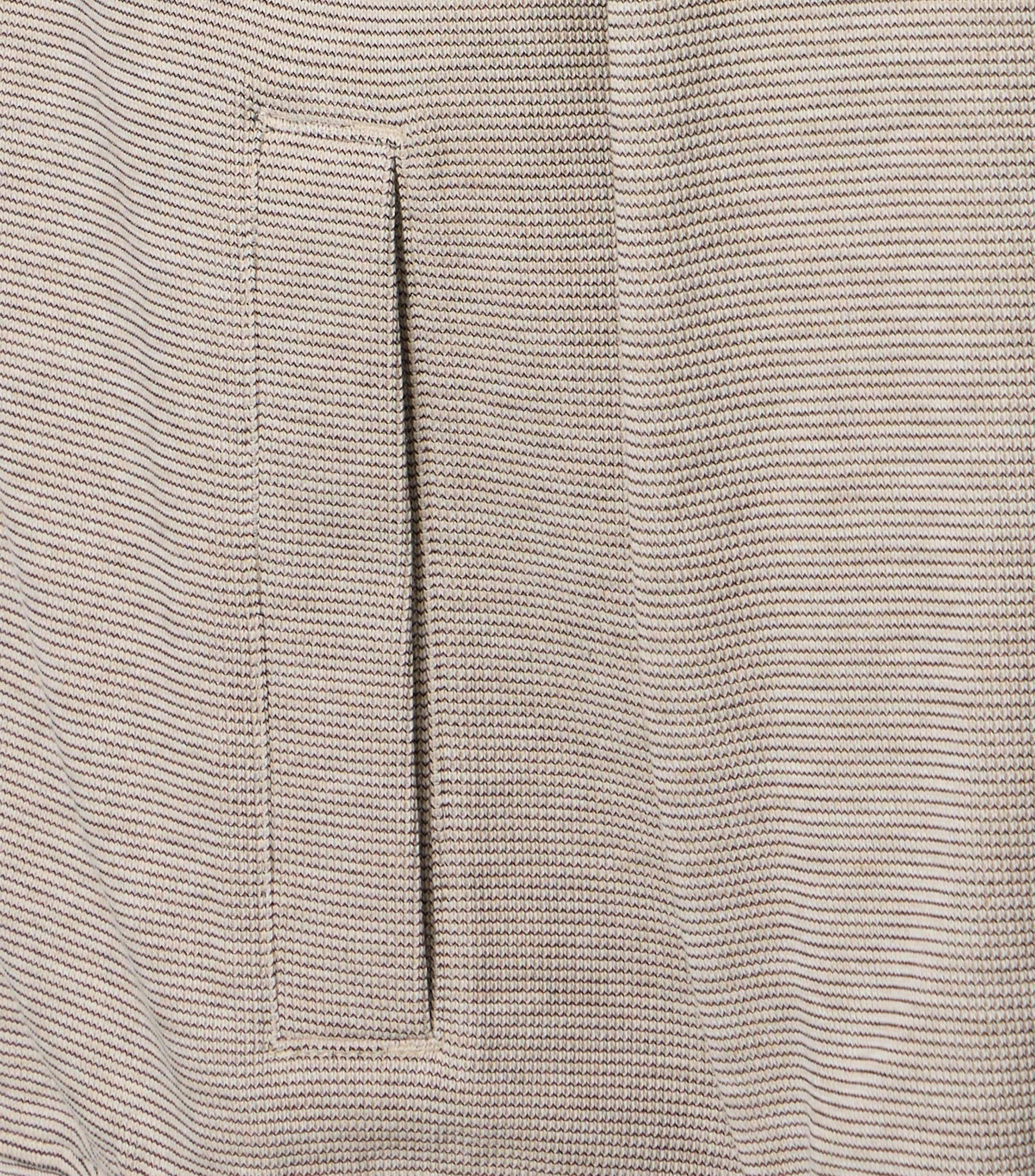 Eine Sweatweste im uni Muster in der Farbe Beige