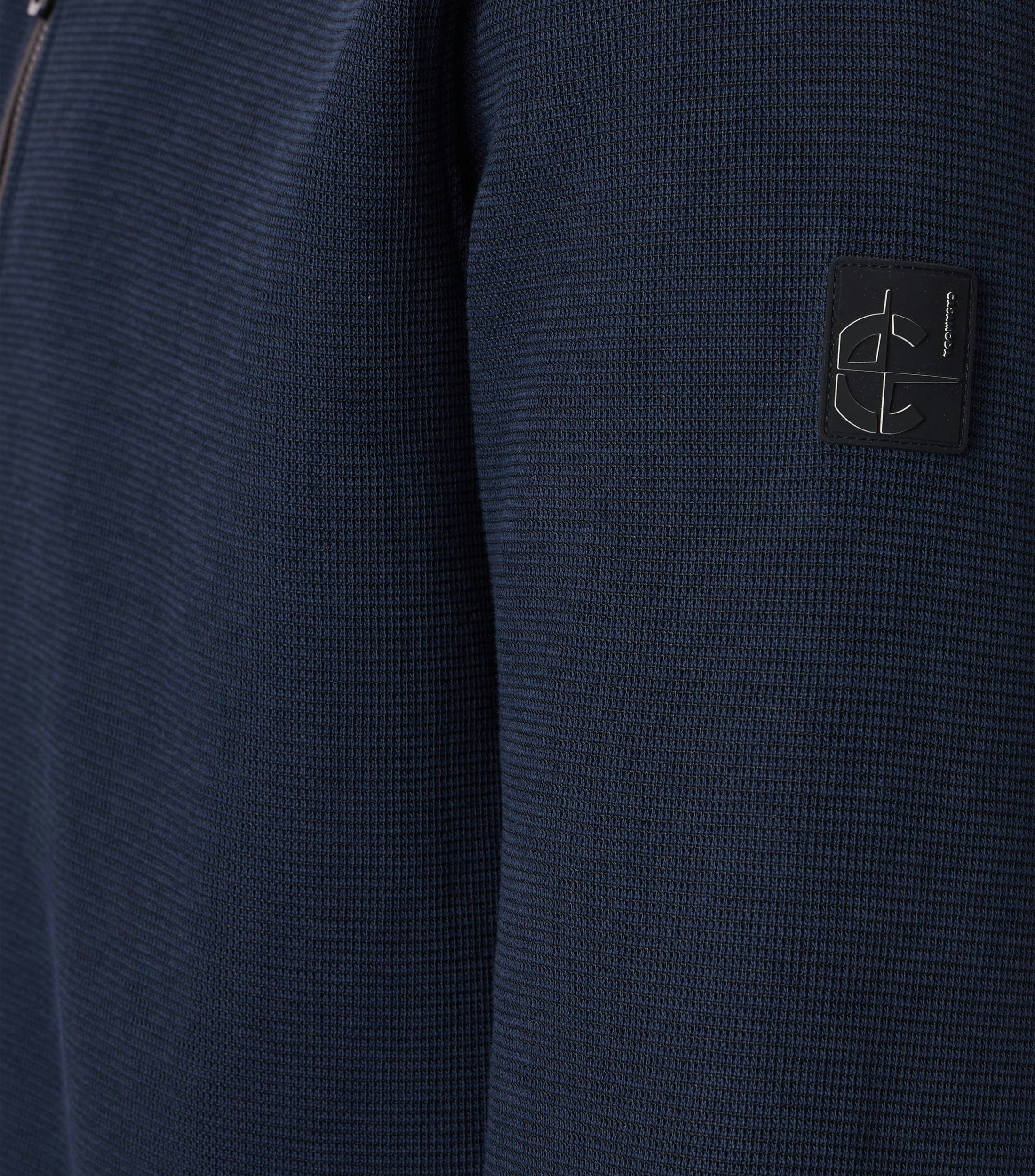 Eine Sweatweste im uni Muster in der Farbe Dunkelblau