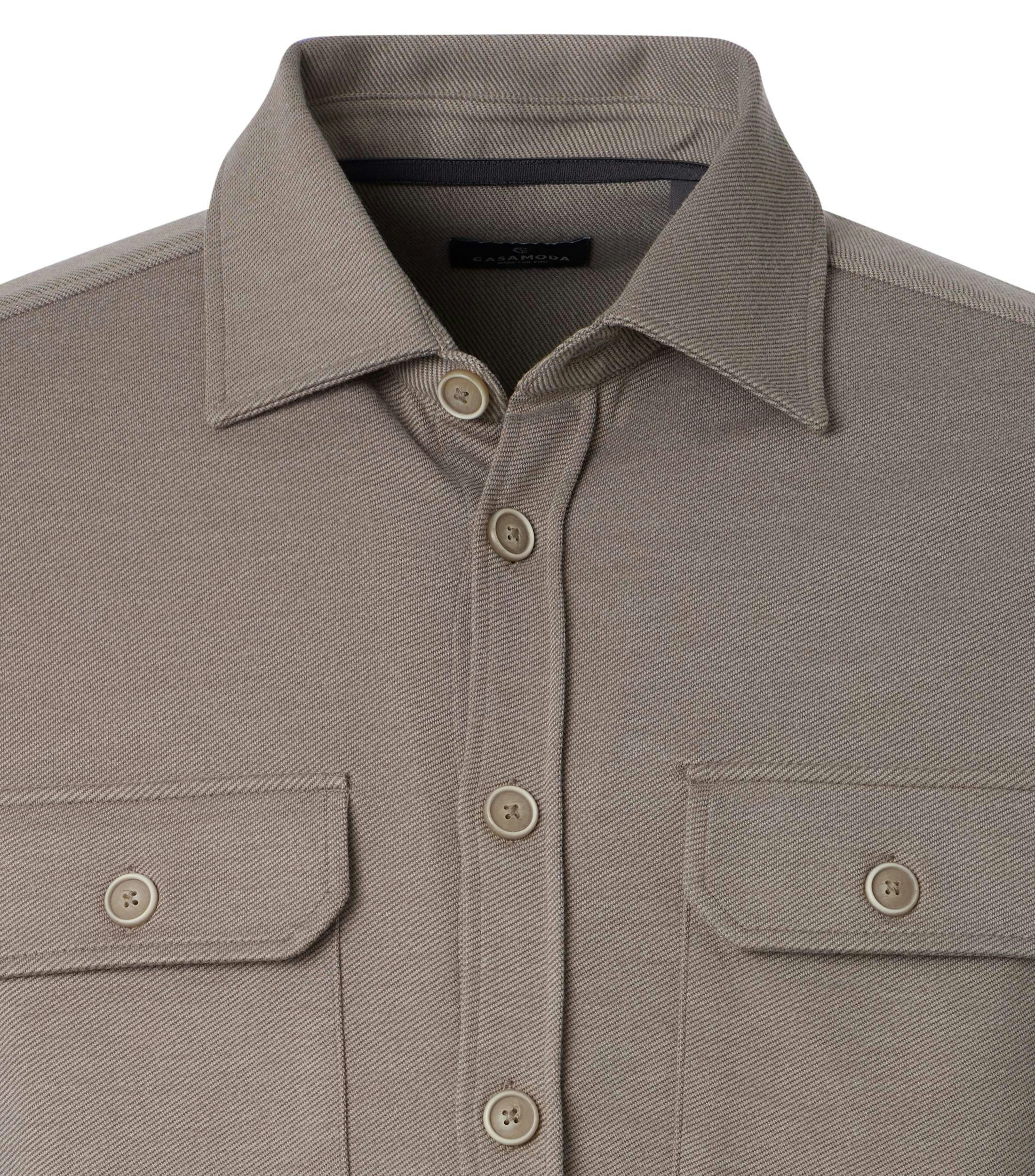 Ein Freizeithemd im uni Muster in der Farbe Beige