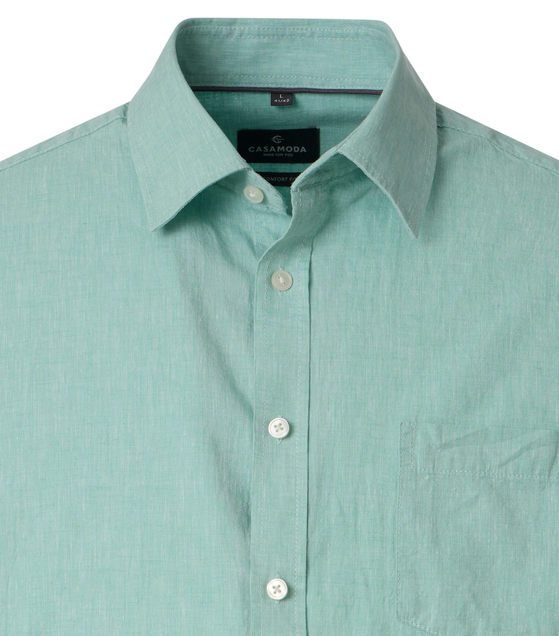 Ein Freizeithemd im uni Muster in der Farbe Grün