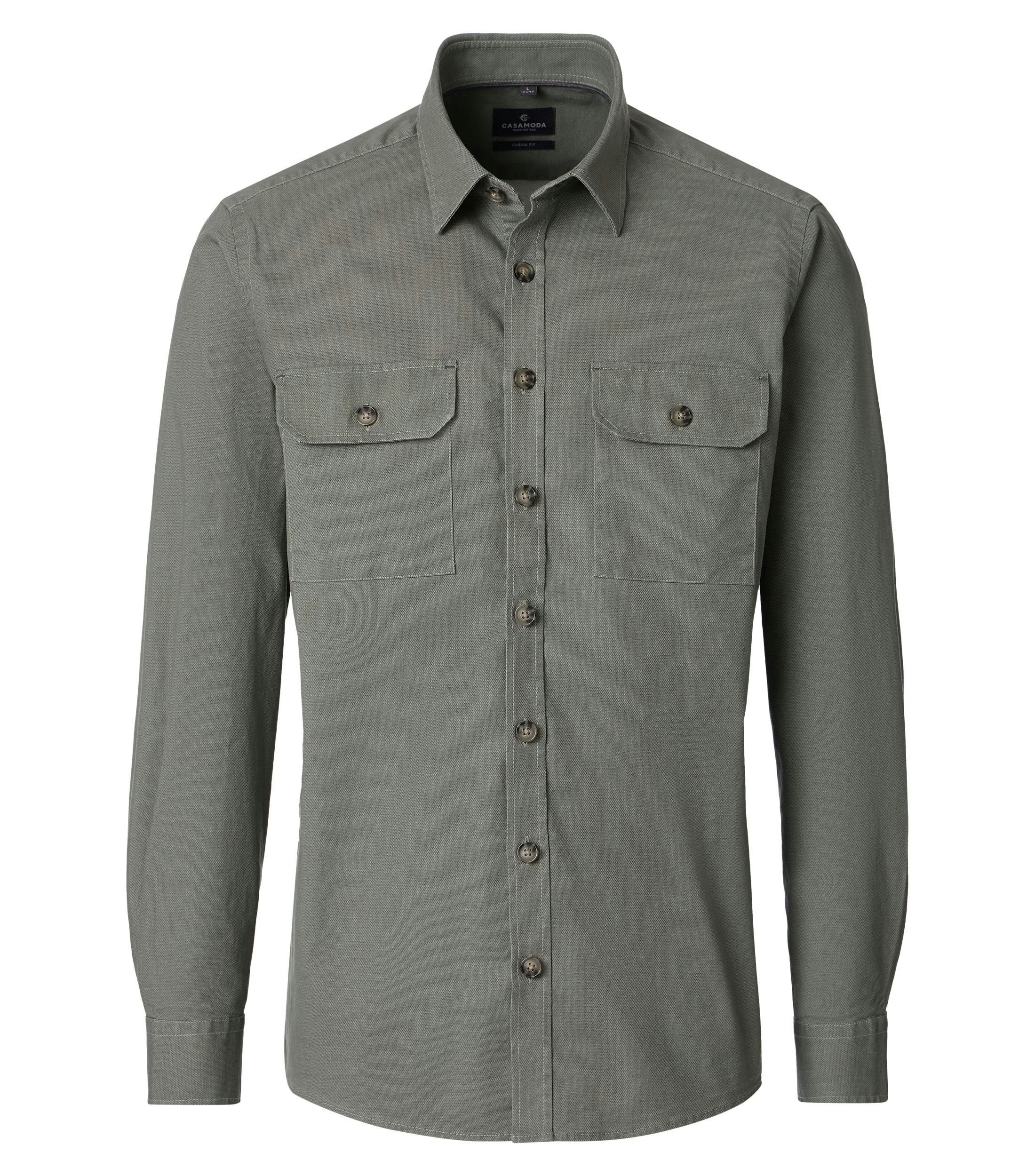 Ein Freizeithemd im uni Muster in der Farbe Grün