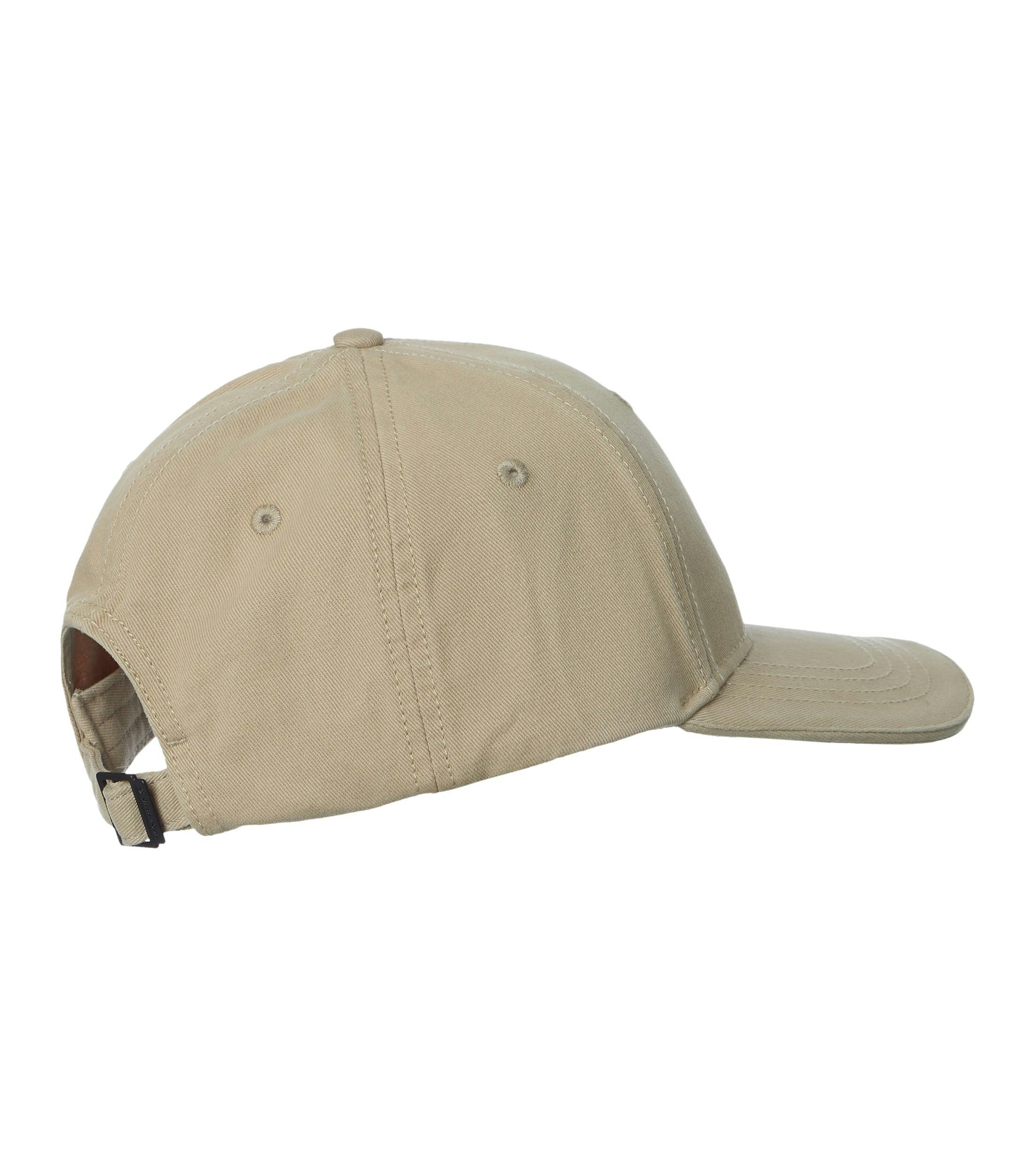 Eine Cap im uni Muster in der Farbe Beige