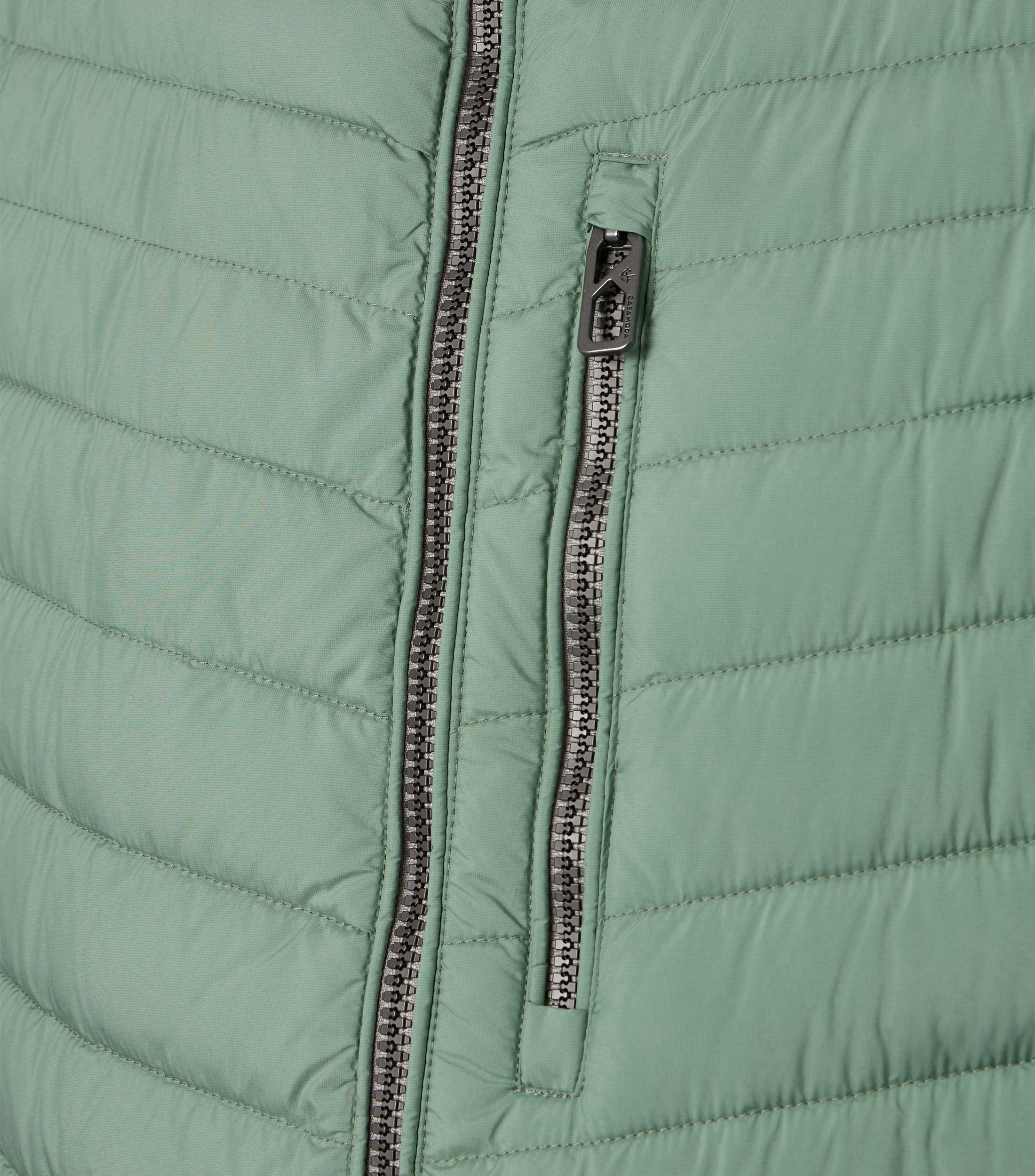 Eine Weste im uni Muster in der Farbe Hellgrün