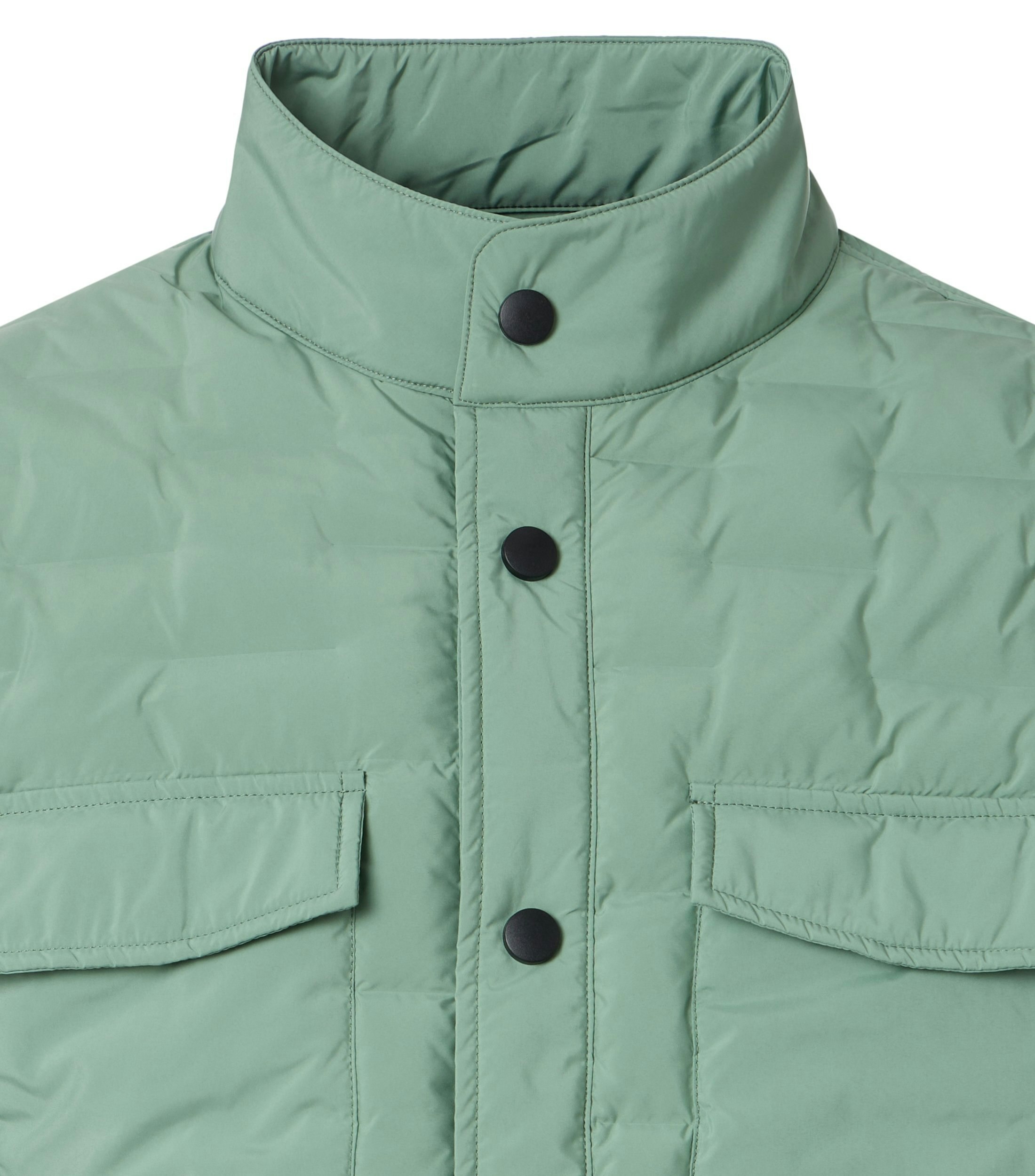 Eine Jacke im uni Muster in der Farbe Hellgrün