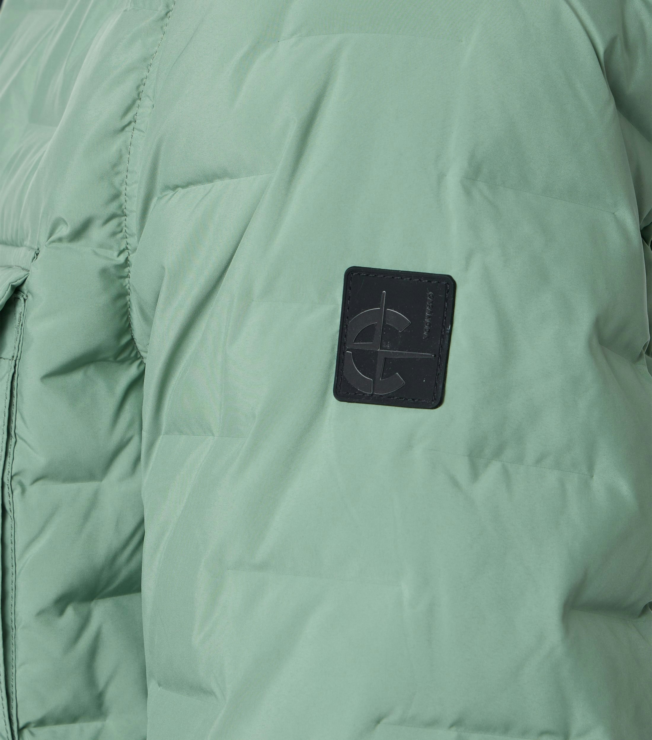 Eine Jacke im uni Muster in der Farbe Hellgrün