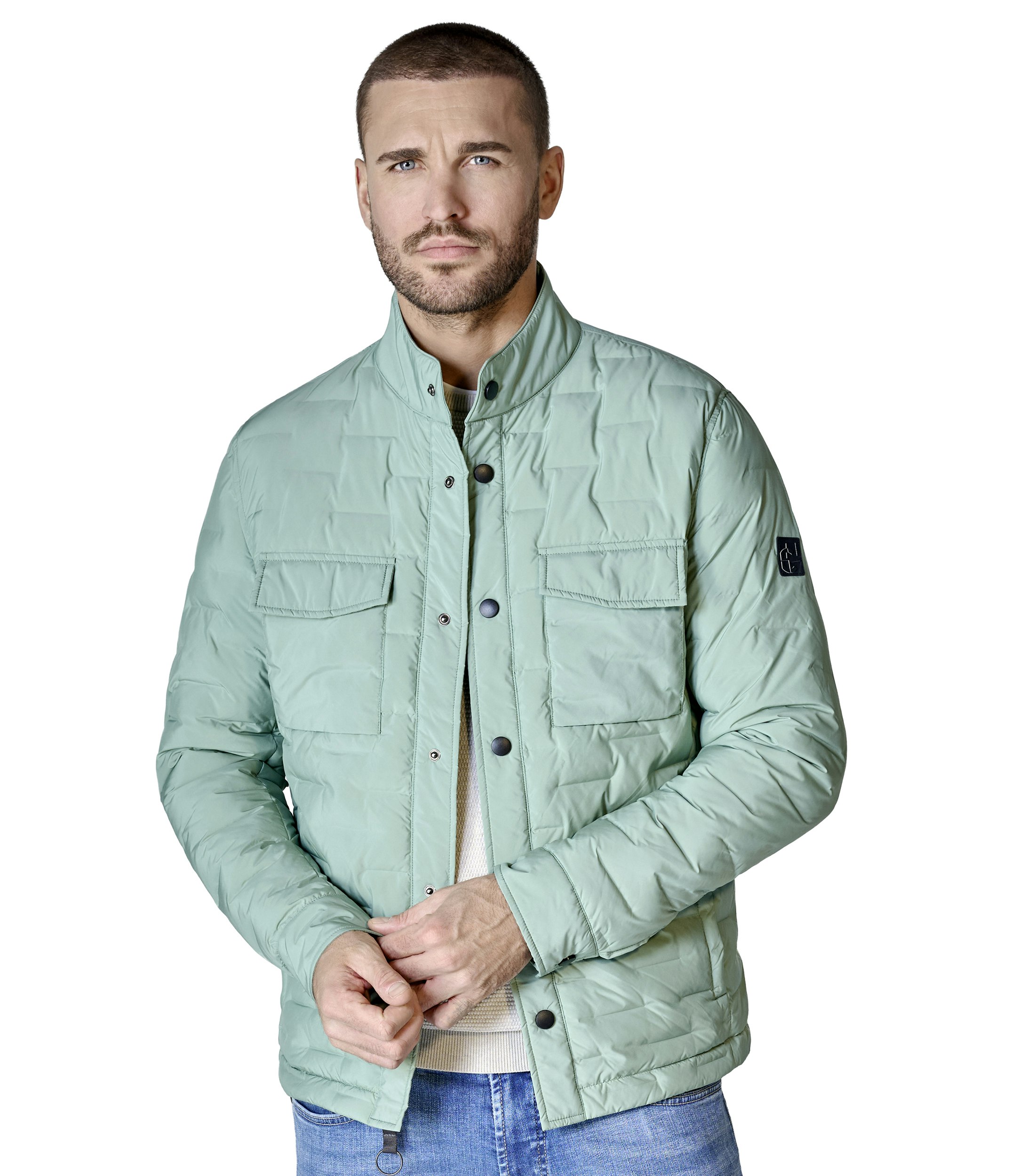 Eine Jacke im uni Muster in der Farbe Hellgrün