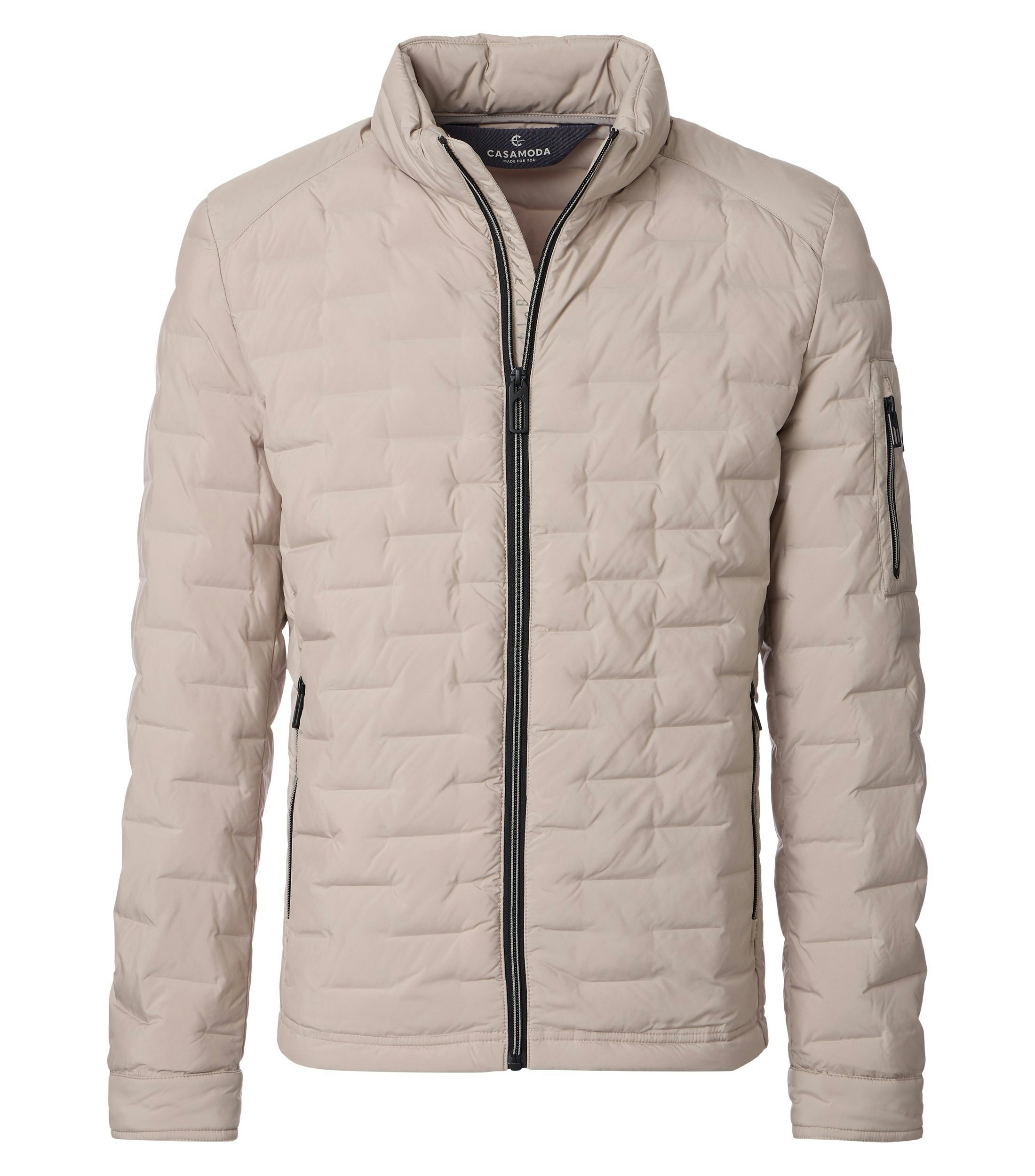 Eine Jacke im uni Muster in der Farbe Beige