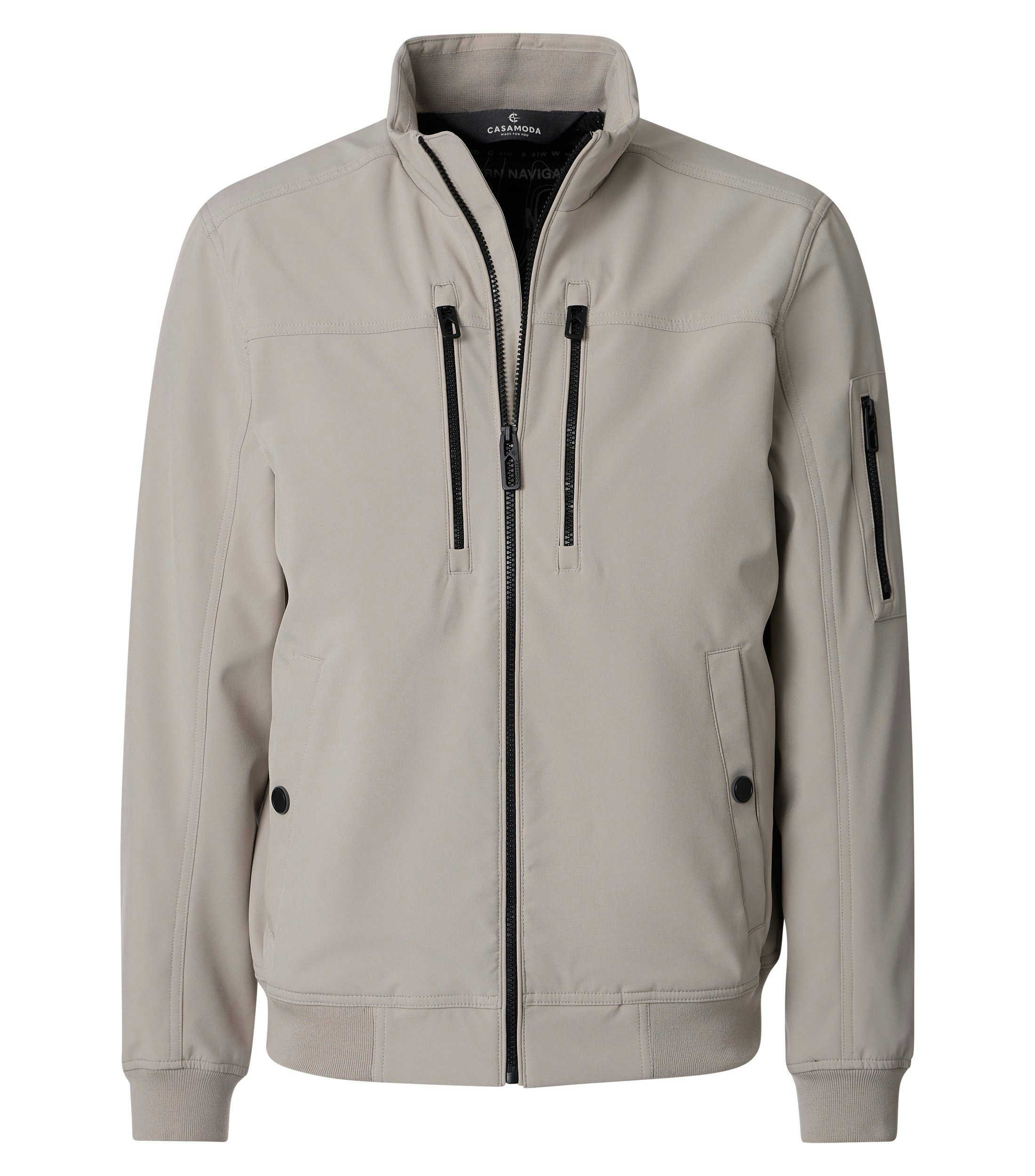 Eine Jacke im uni Muster in der Farbe Beige