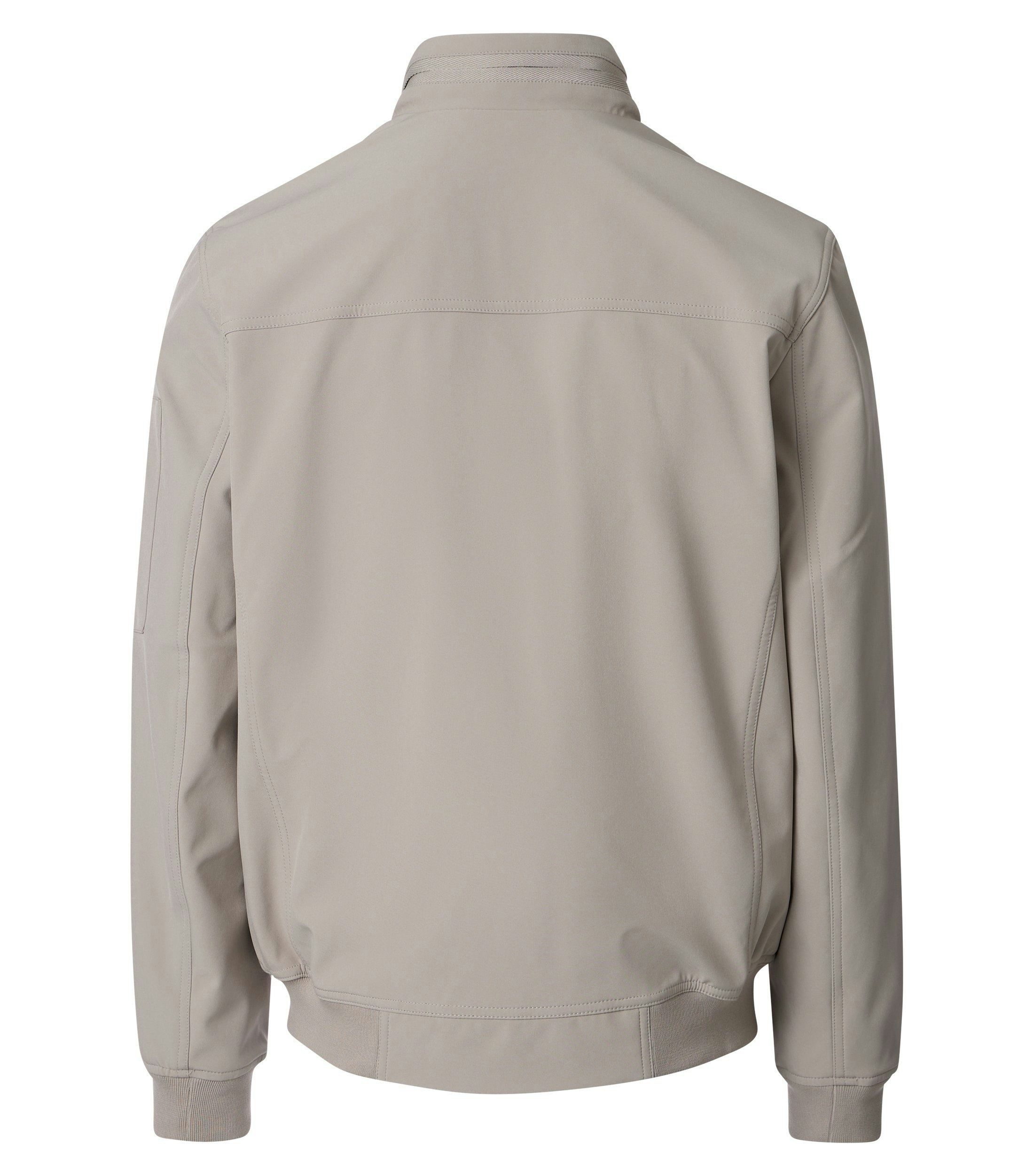 Eine Jacke im uni Muster in der Farbe Beige