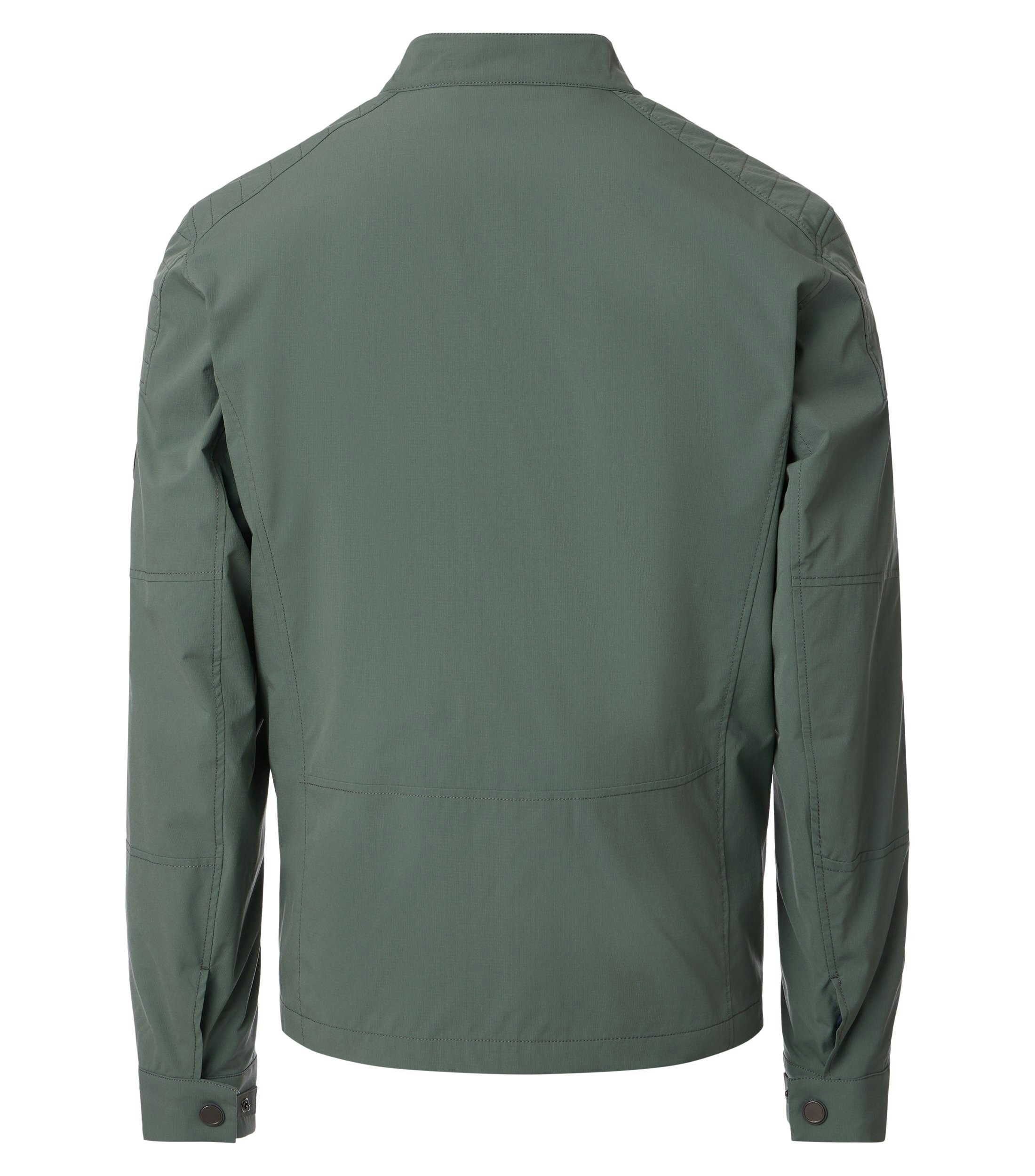 Eine Jacke im uni Muster in der Farbe Grün