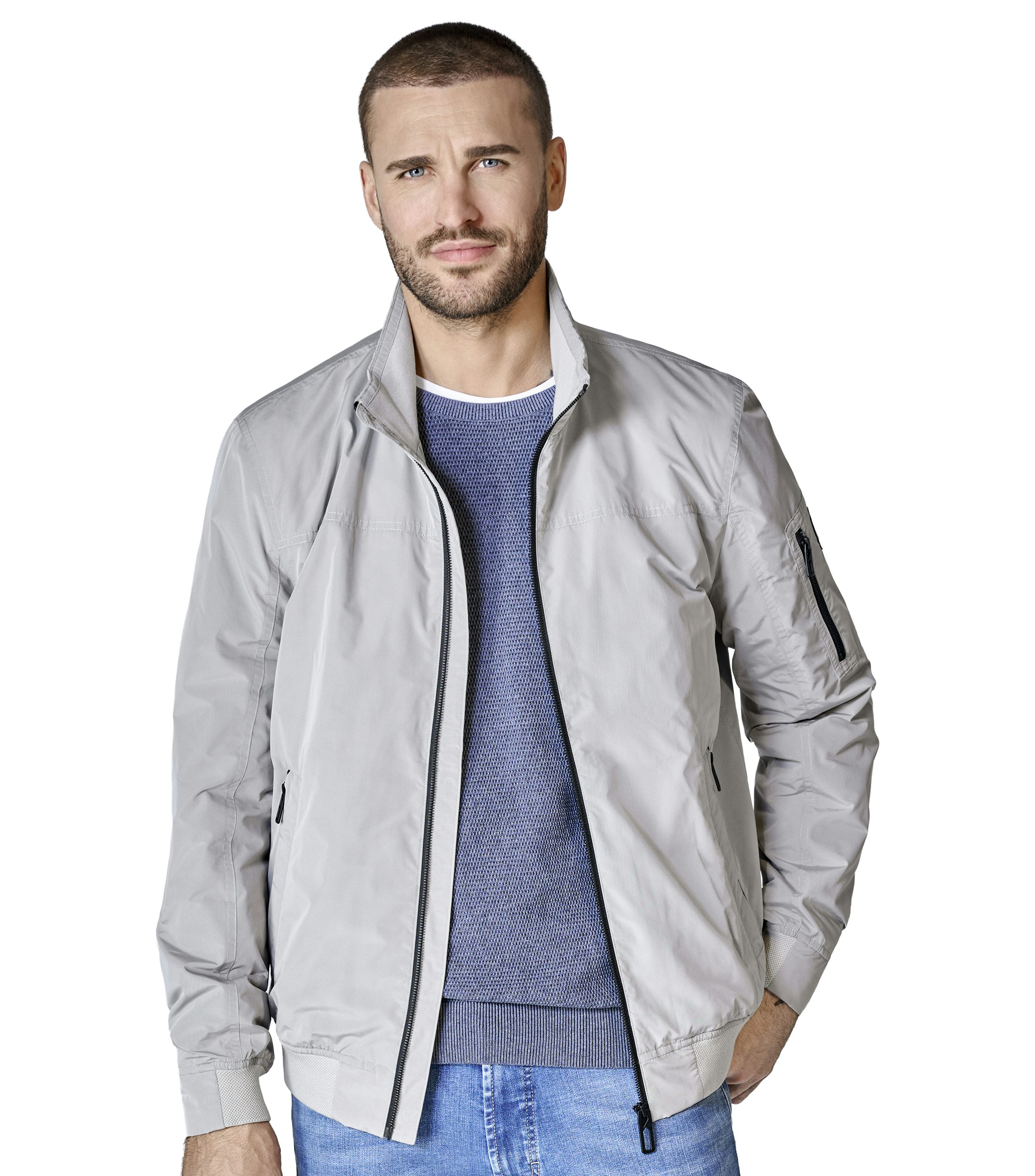 Eine Jacke im uni Muster in der Farbe Hellgrau