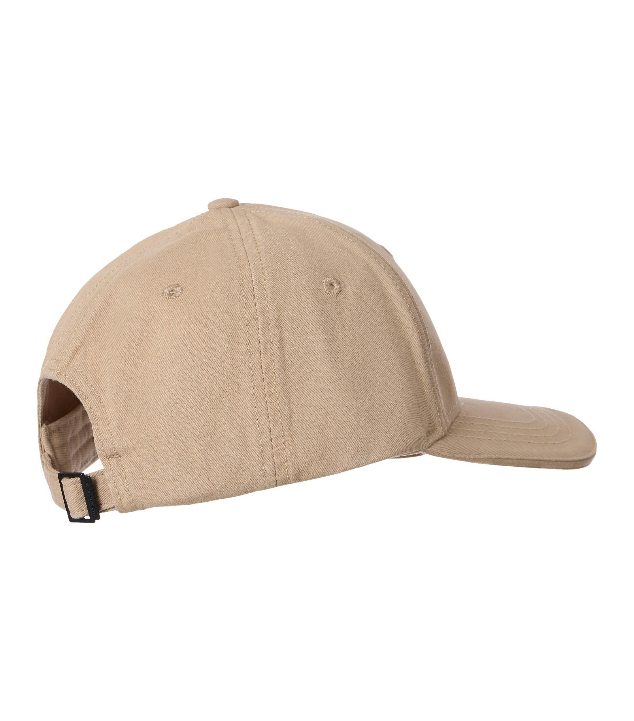 Eine Cap im uni Muster in der Farbe Beige