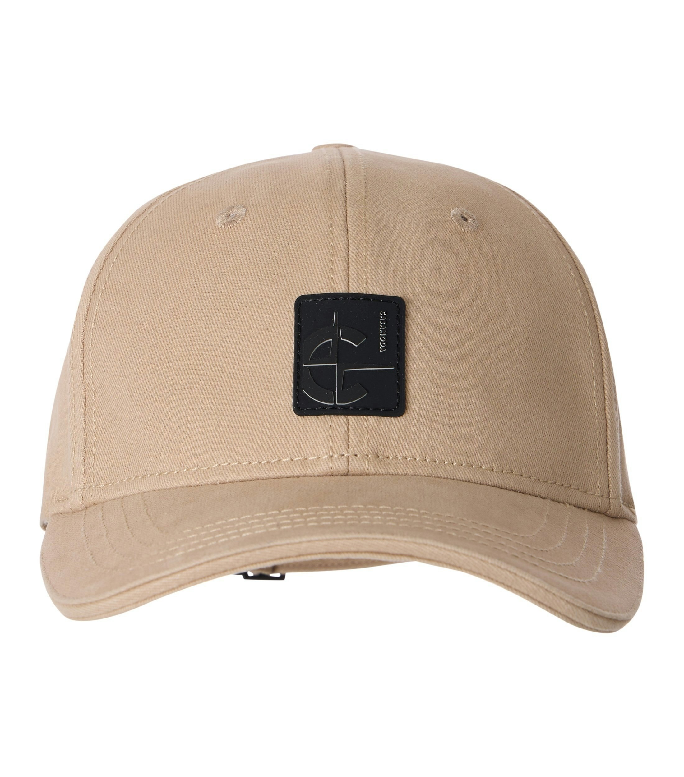 Eine Cap im uni Muster in der Farbe Beige