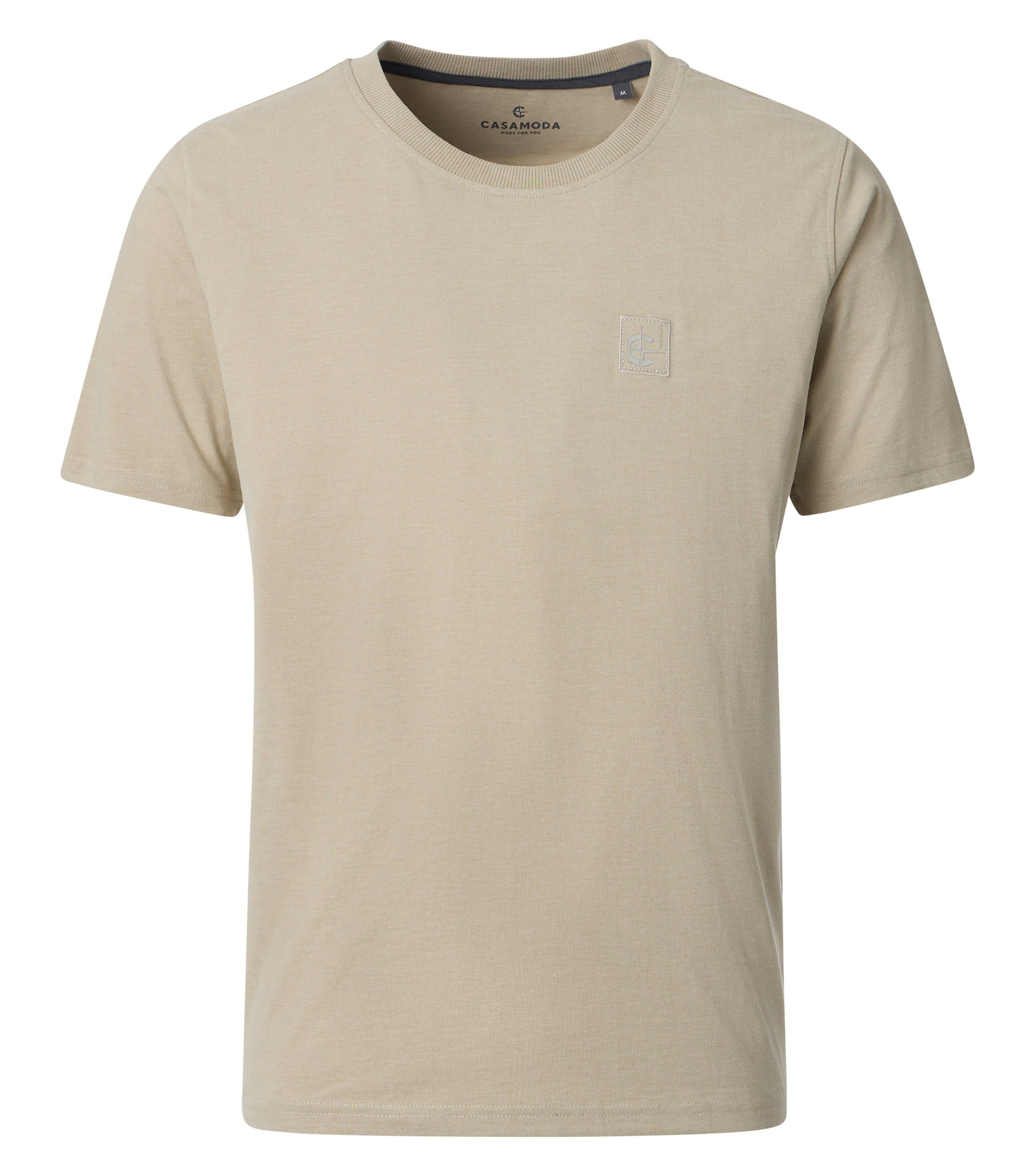 Ein T-Shirt im uni Muster in der Farbe Beige
