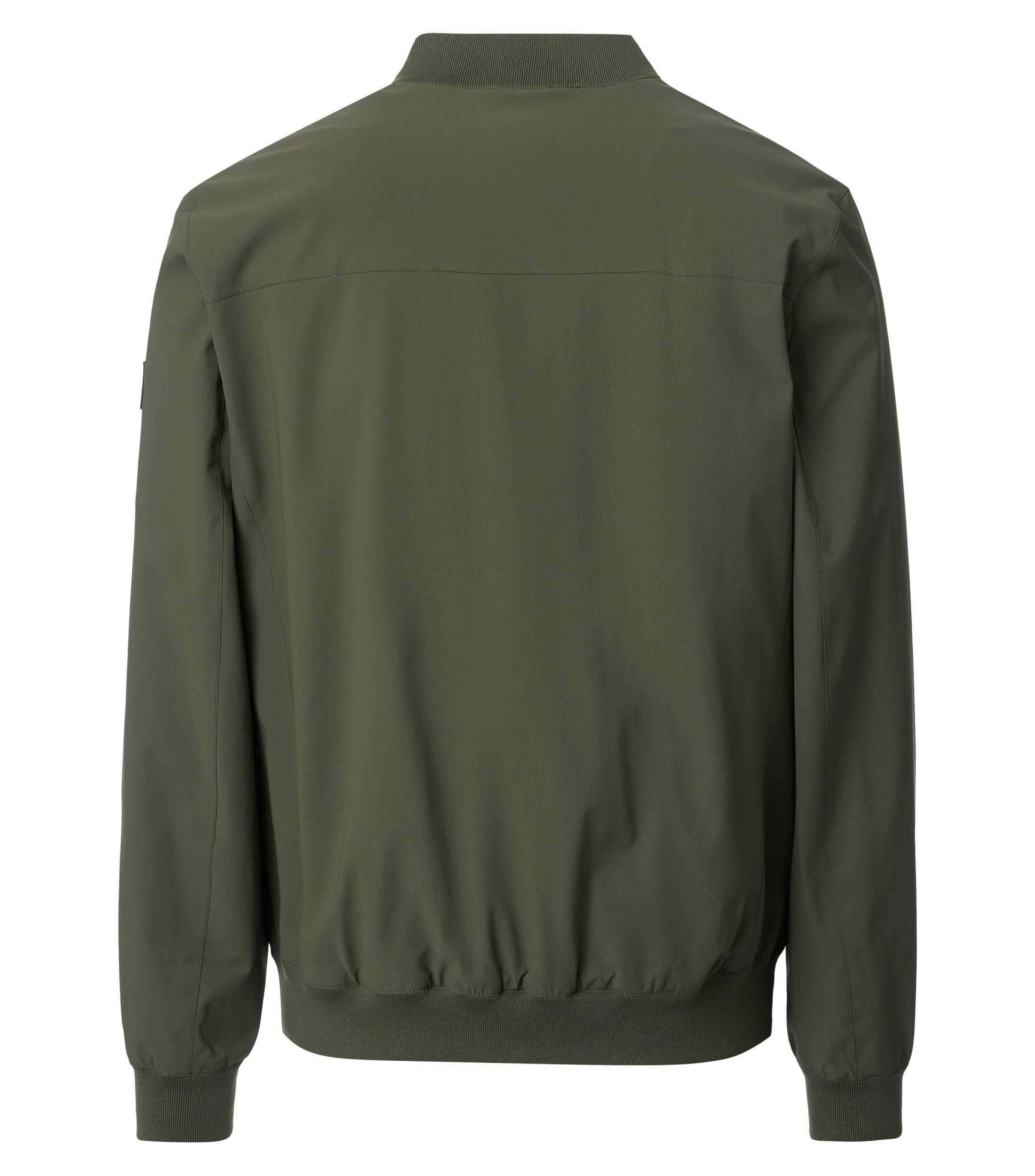 Eine Jacke im uni Muster in der Farbe Olive