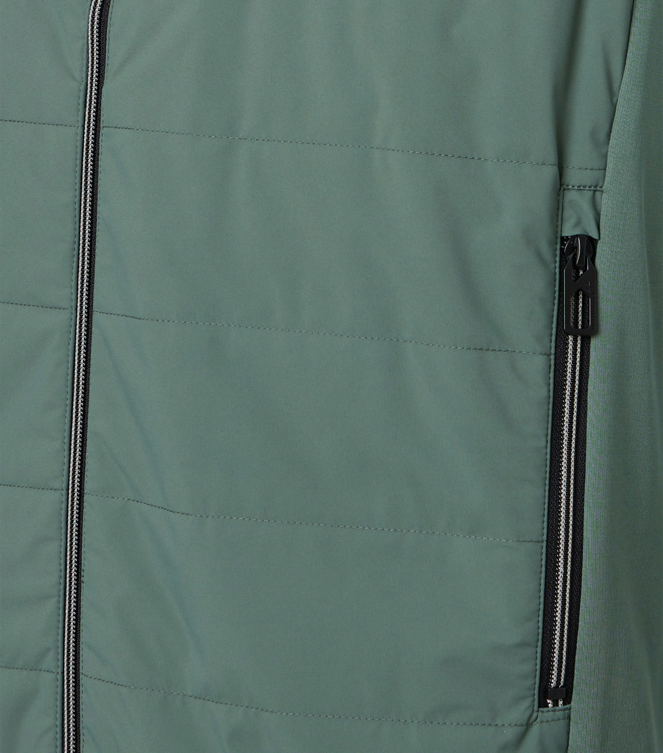 Eine Weste im uni Muster in der Farbe Grün