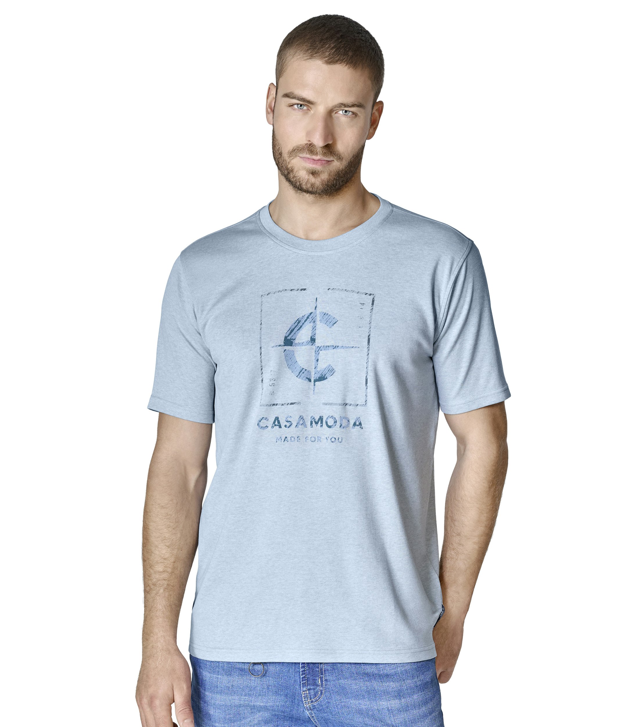 Ein T-Shirt im uni Muster in der Farbe Türkis