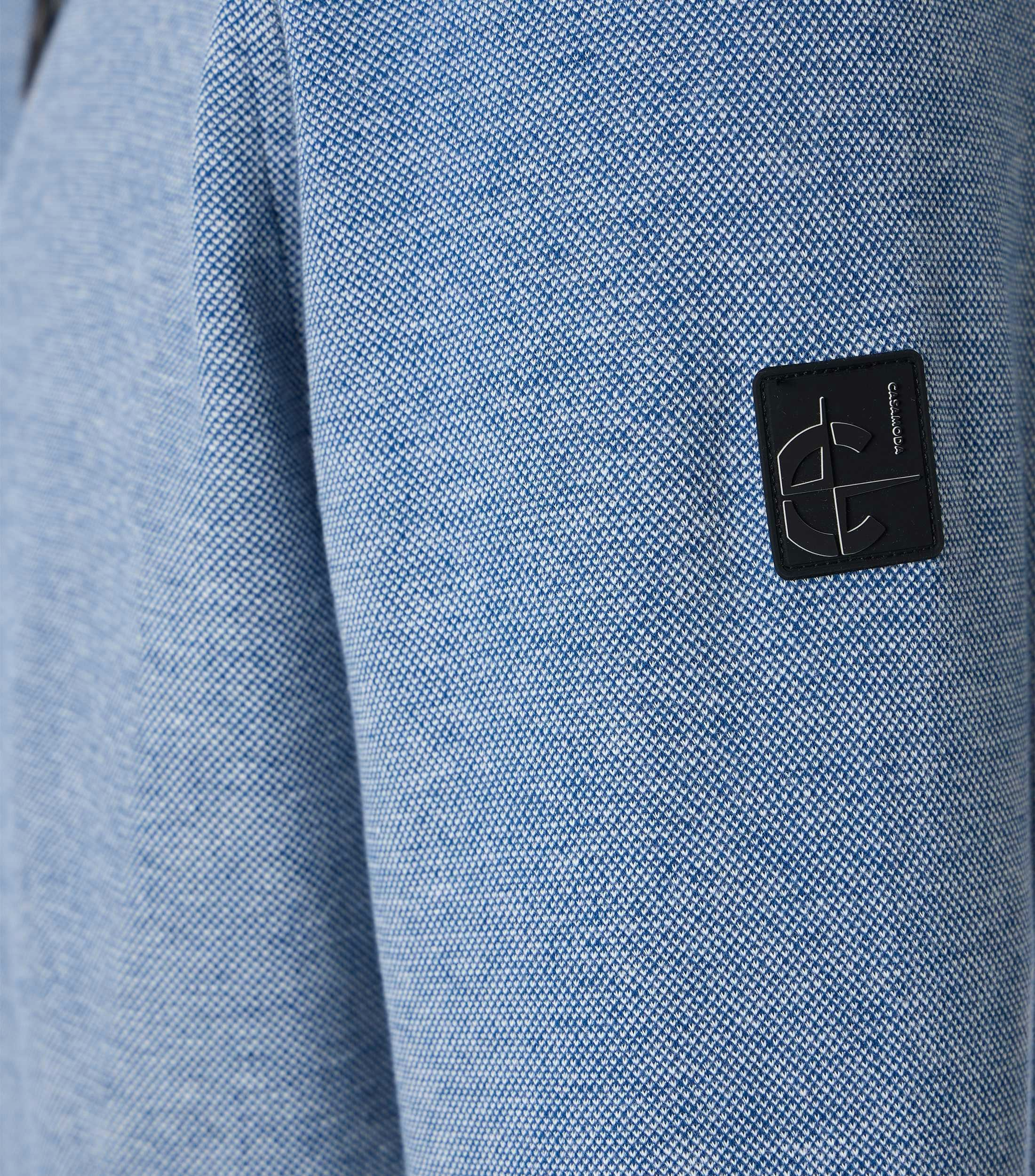 Eine Sweatweste im uni Muster in der Farbe Blau