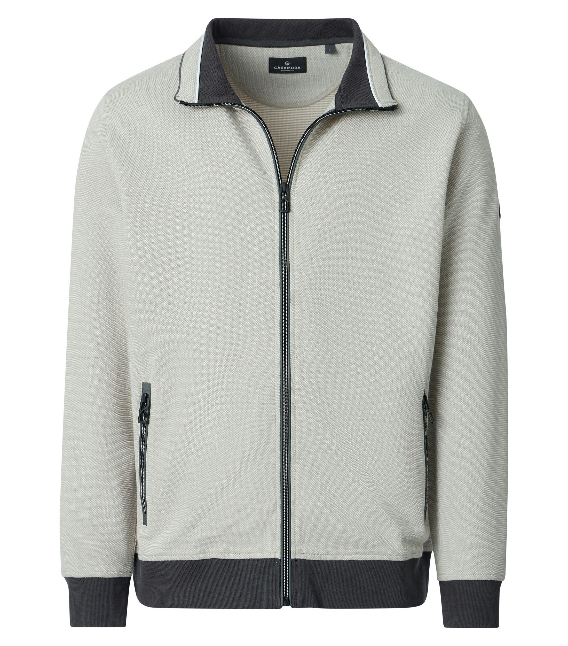 Eine Sweatweste im uni Muster in der Farbe Beige