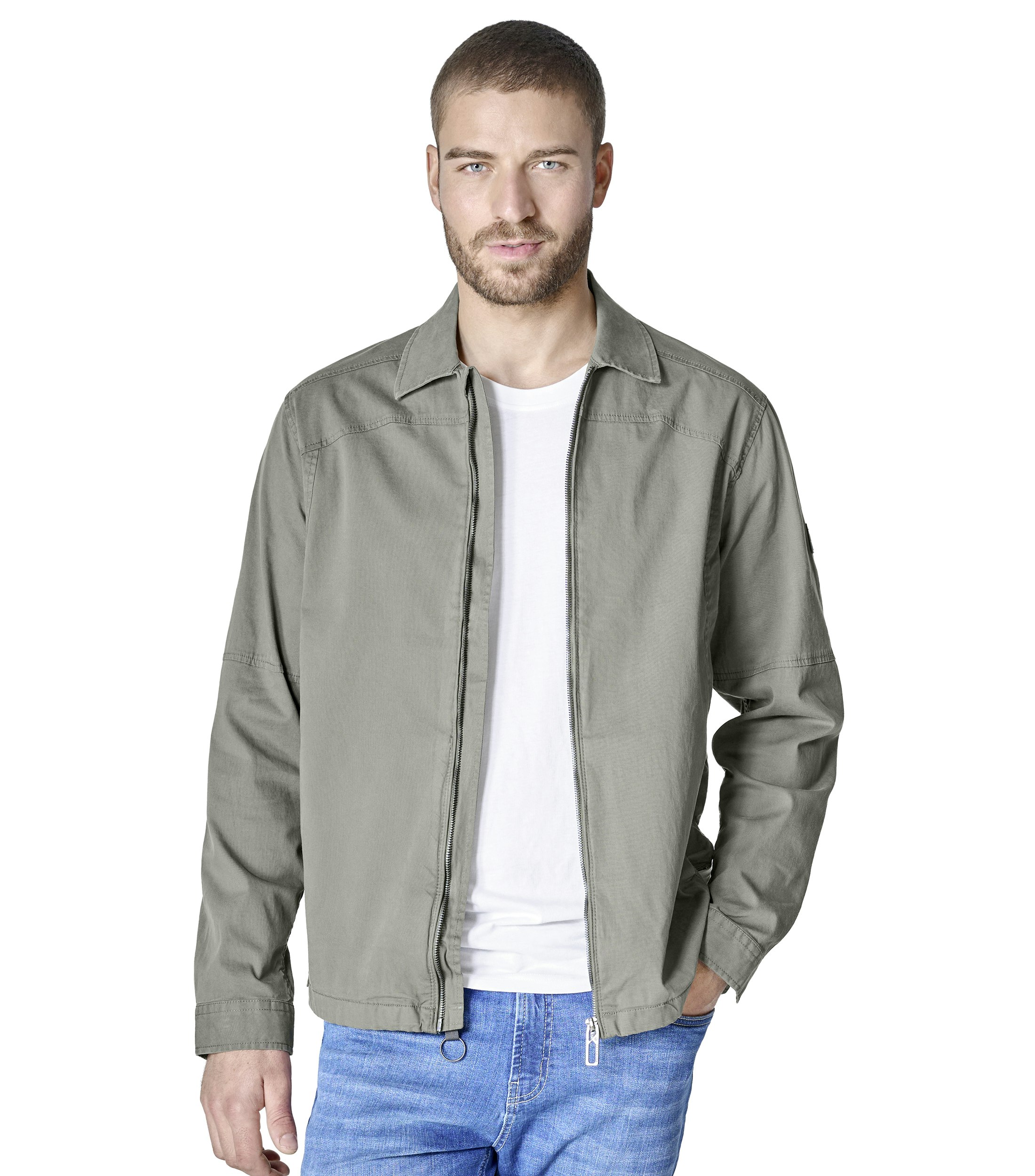 Eine Jacke im uni Muster in der Farbe Grün