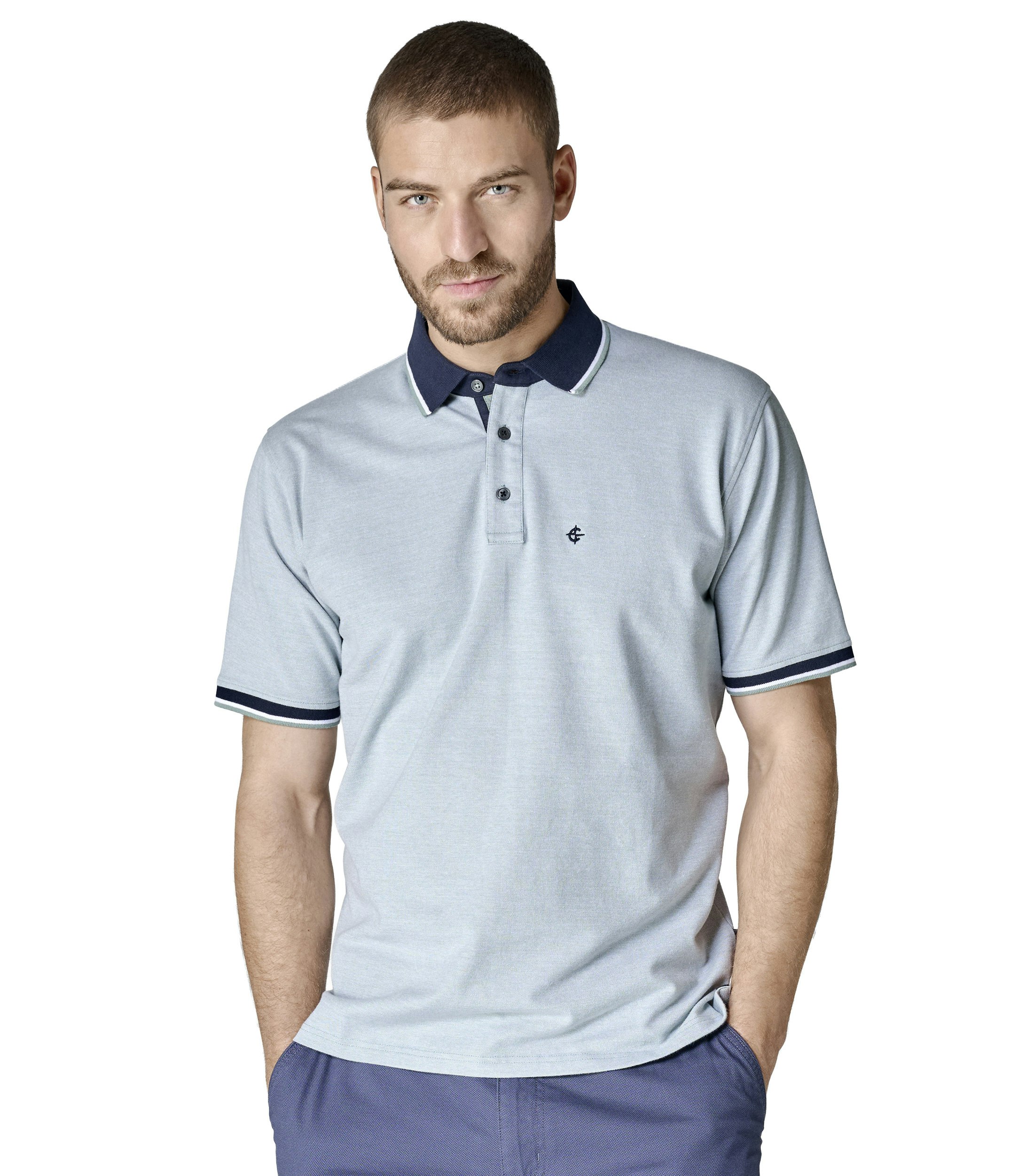 Ein Polo-Shirt im uni Muster in der Farbe Helltürkis