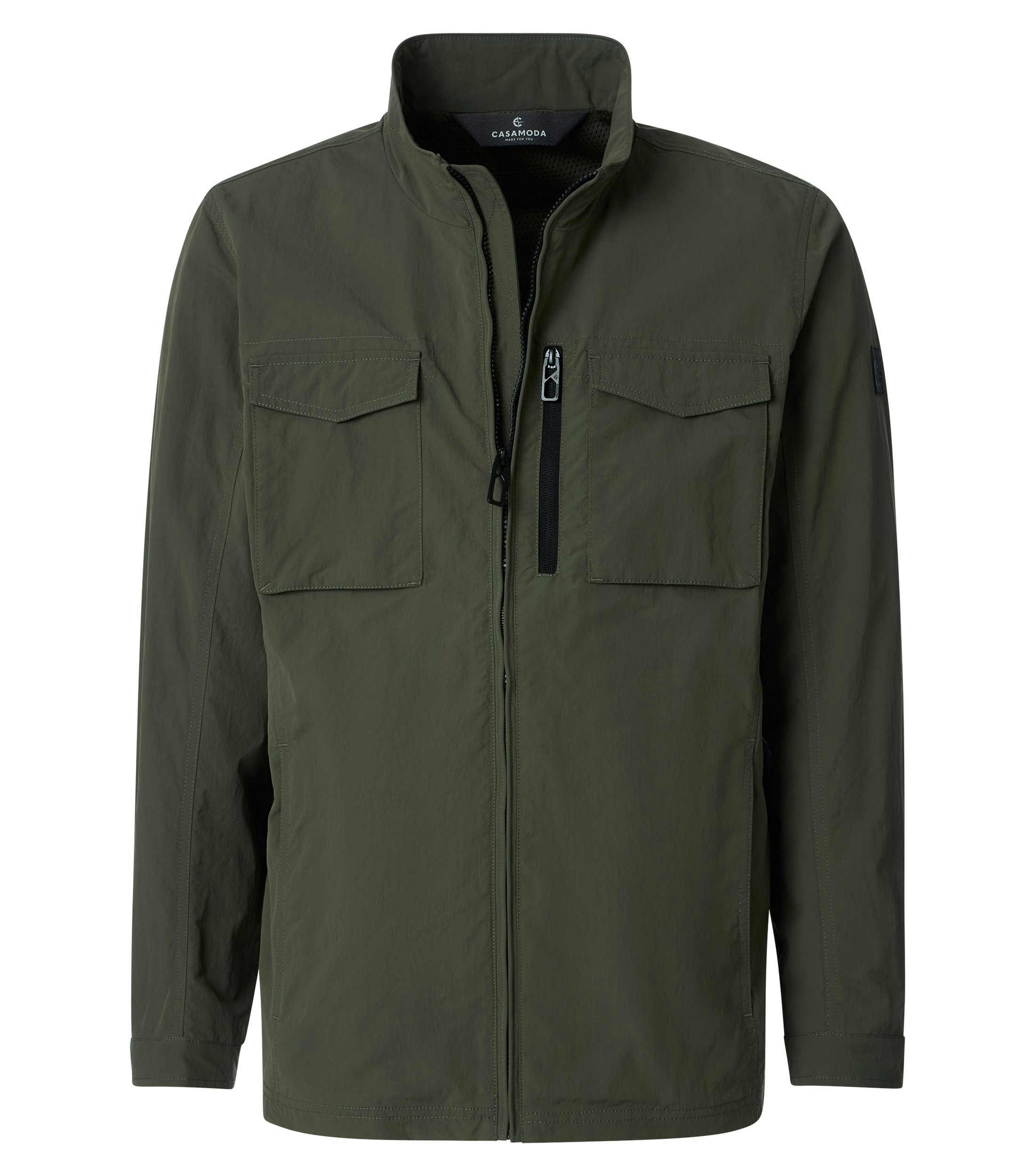 Eine Jacke im uni Muster in der Farbe Grün