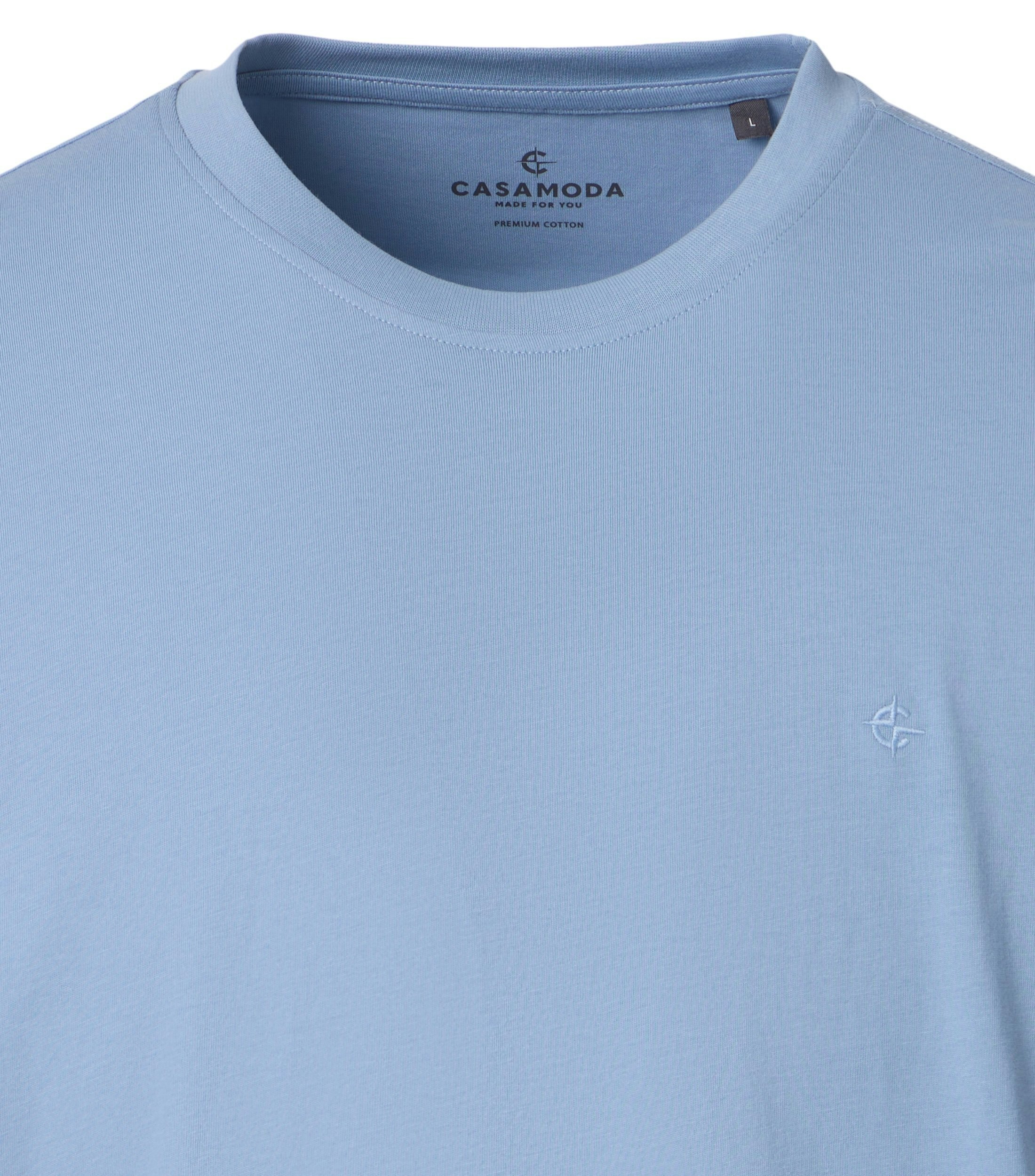 Ein T-Shirt im uni Muster in der Farbe Weiß