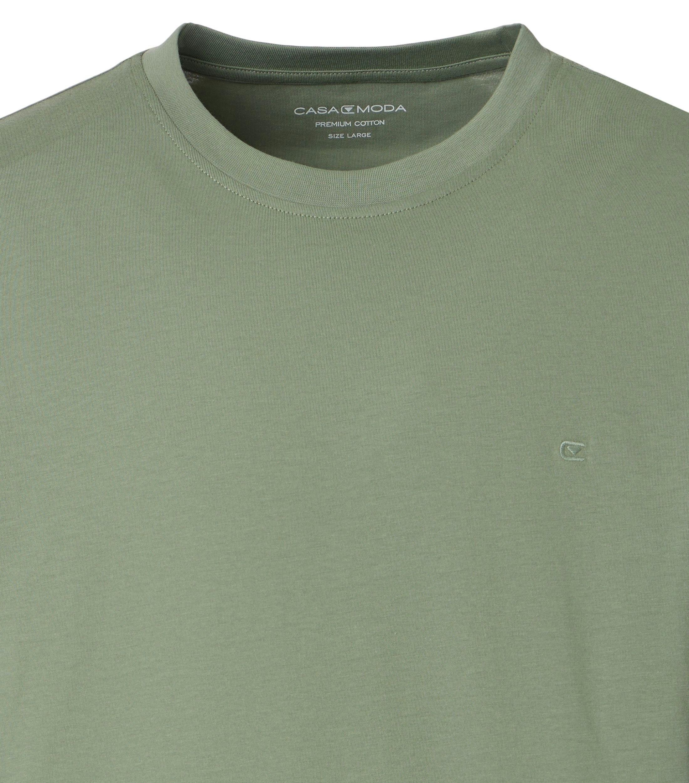 Ein T-Shirt im uni Muster in der Farbe Türkis